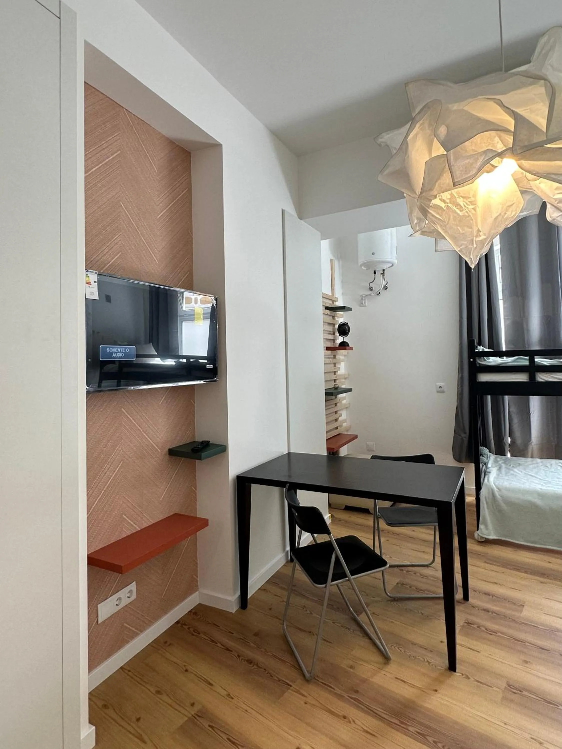 Bed in Glass Boutique - Rooms & Suites