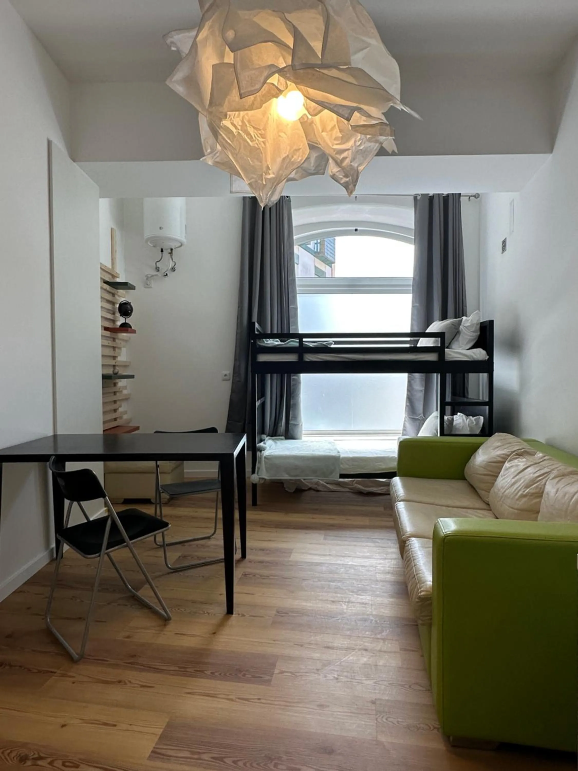 Bed in Glass Boutique - Rooms & Suites