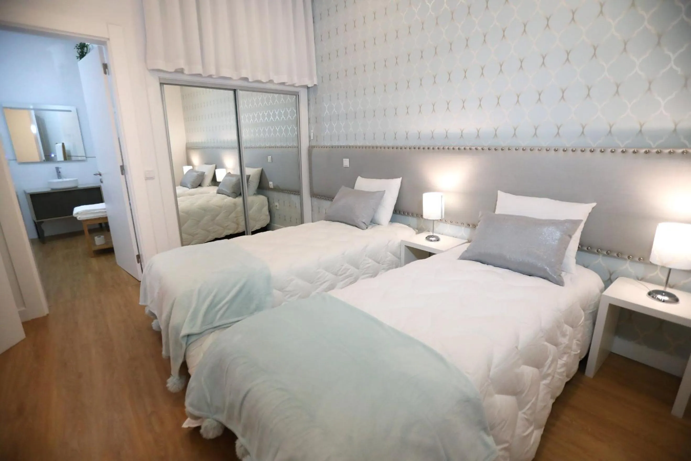 Bed in Glass Boutique - Rooms & Suites