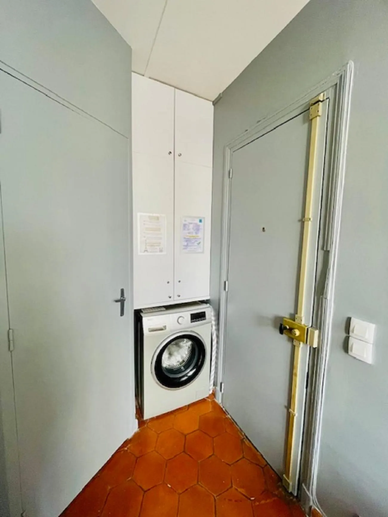 washing machine in Le Pavillon Hotel