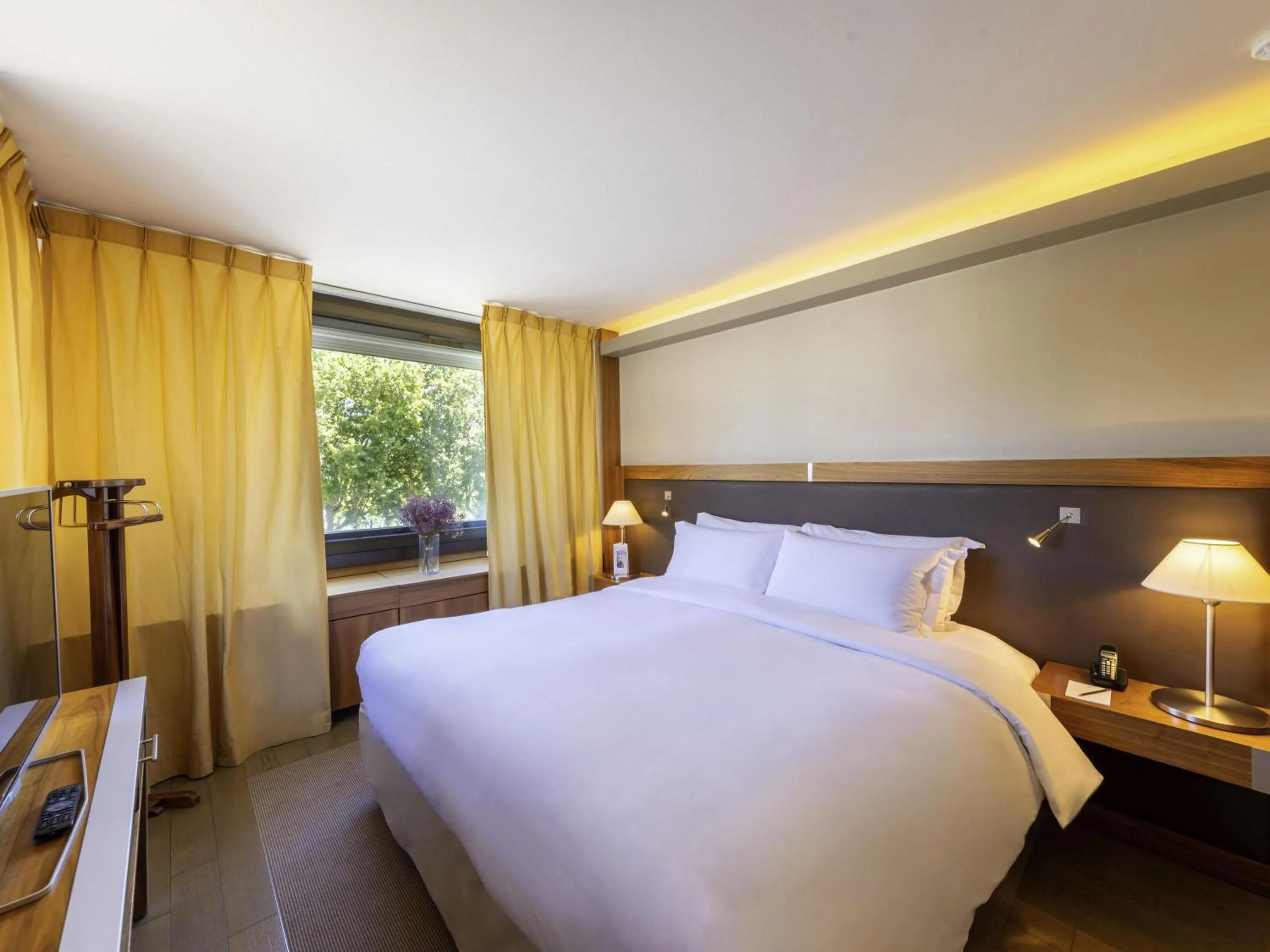 Photo of the whole room, Bed in Sofitel Lyon Bellecour