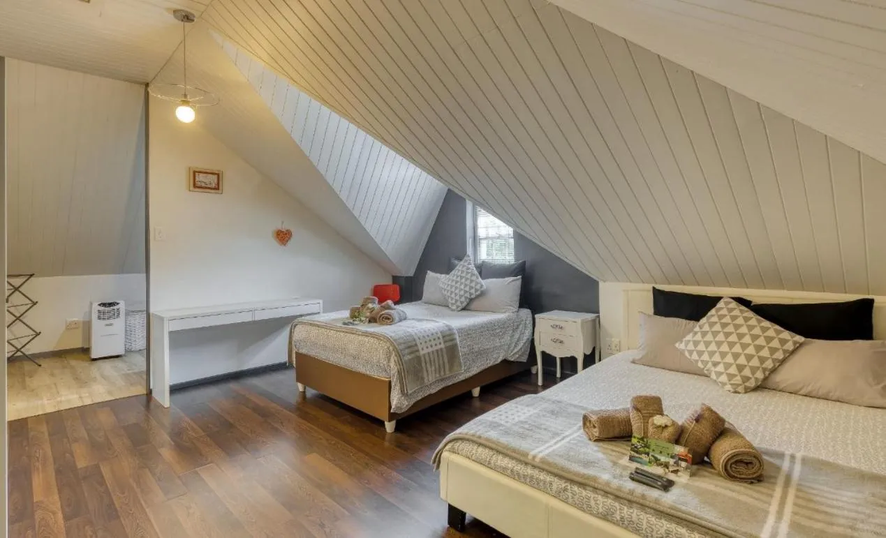 Bed in B&B Sauvignon Country Lodge