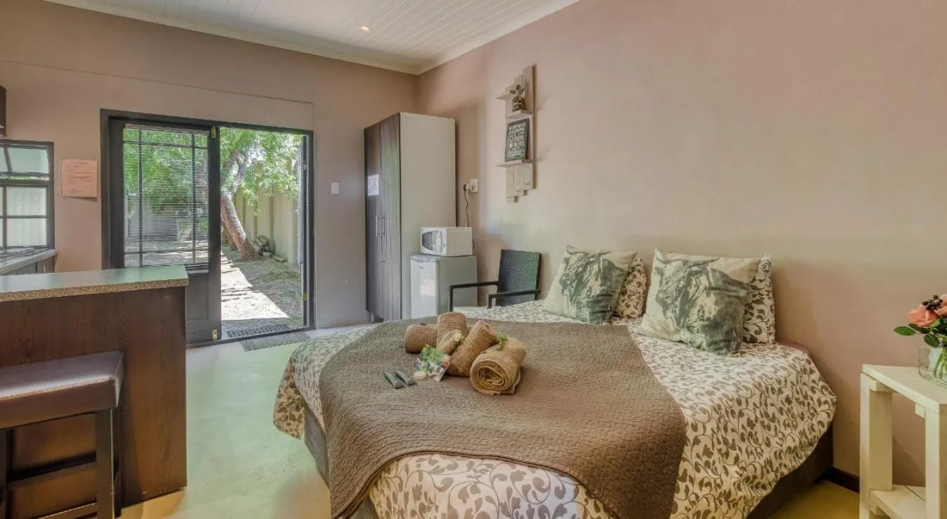 Bed in B&B Sauvignon Country Lodge