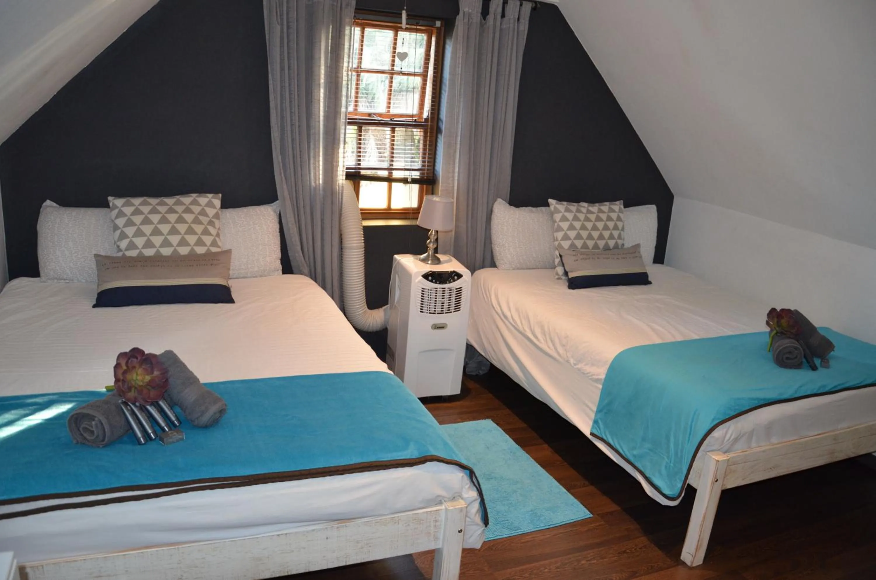 Bed in B&B Sauvignon Country Lodge