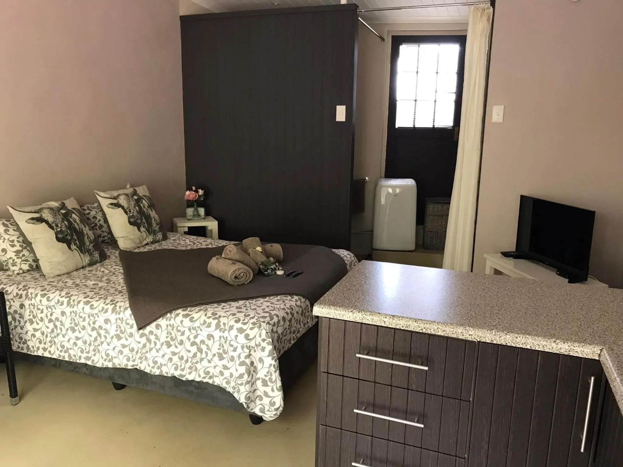 Bed in B&B Sauvignon Country Lodge