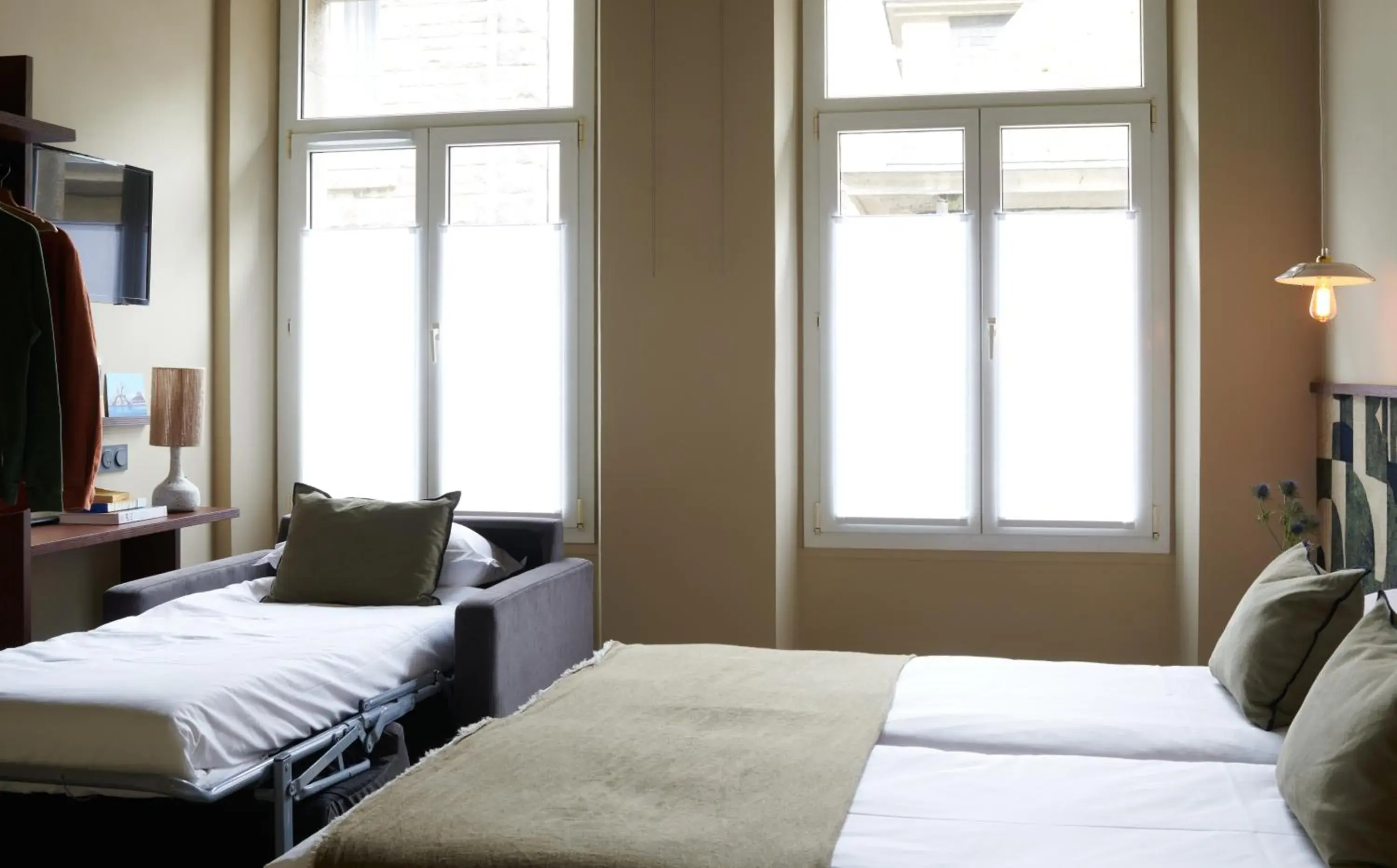 Triple Room in Hôtel Cartier Triple Room in Hôtel Cartier