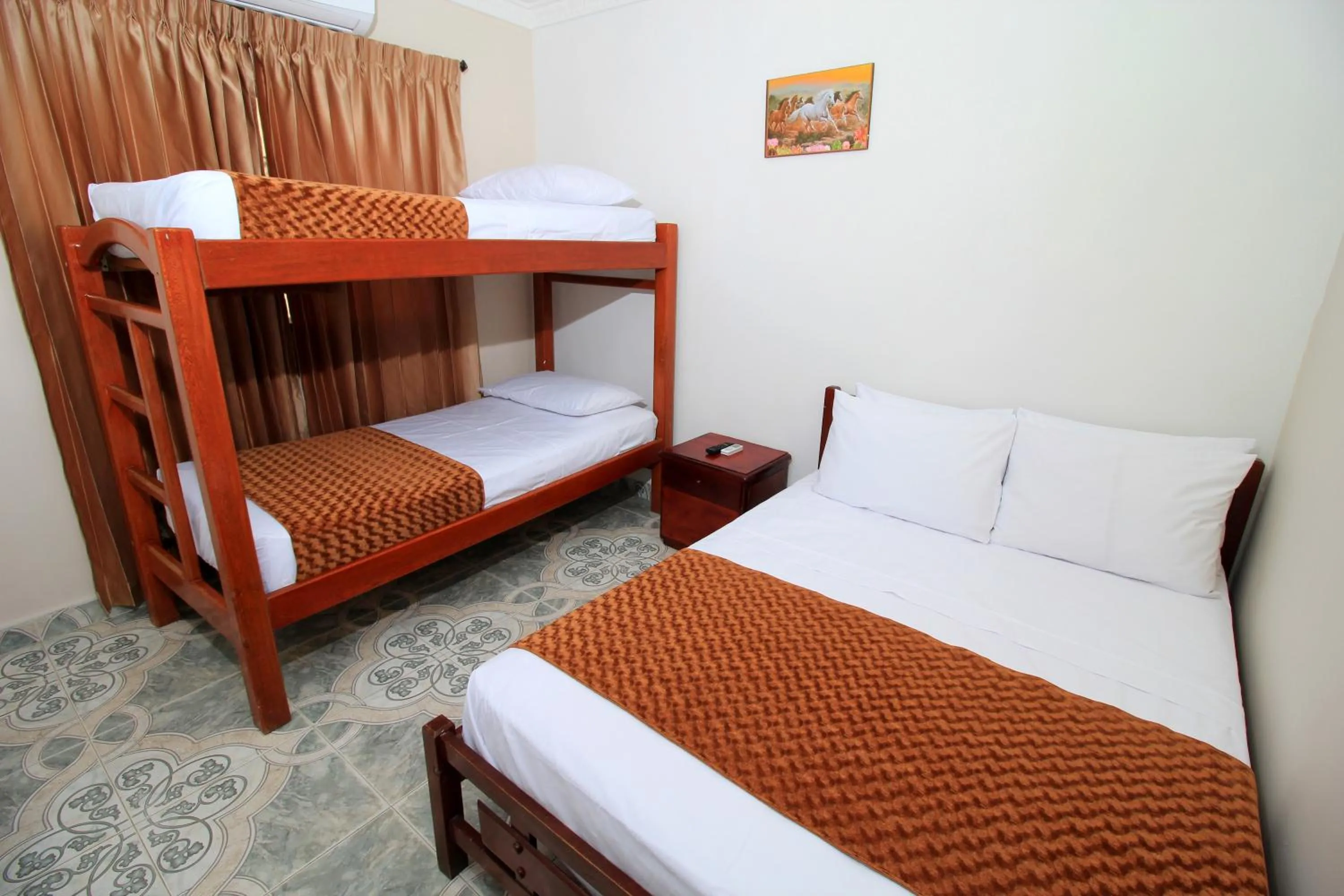 Bed in Hotel Rodadero Inn By GEH Suites