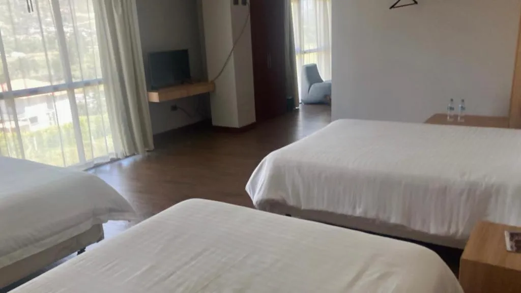 Bed in Hosteria Arhaná