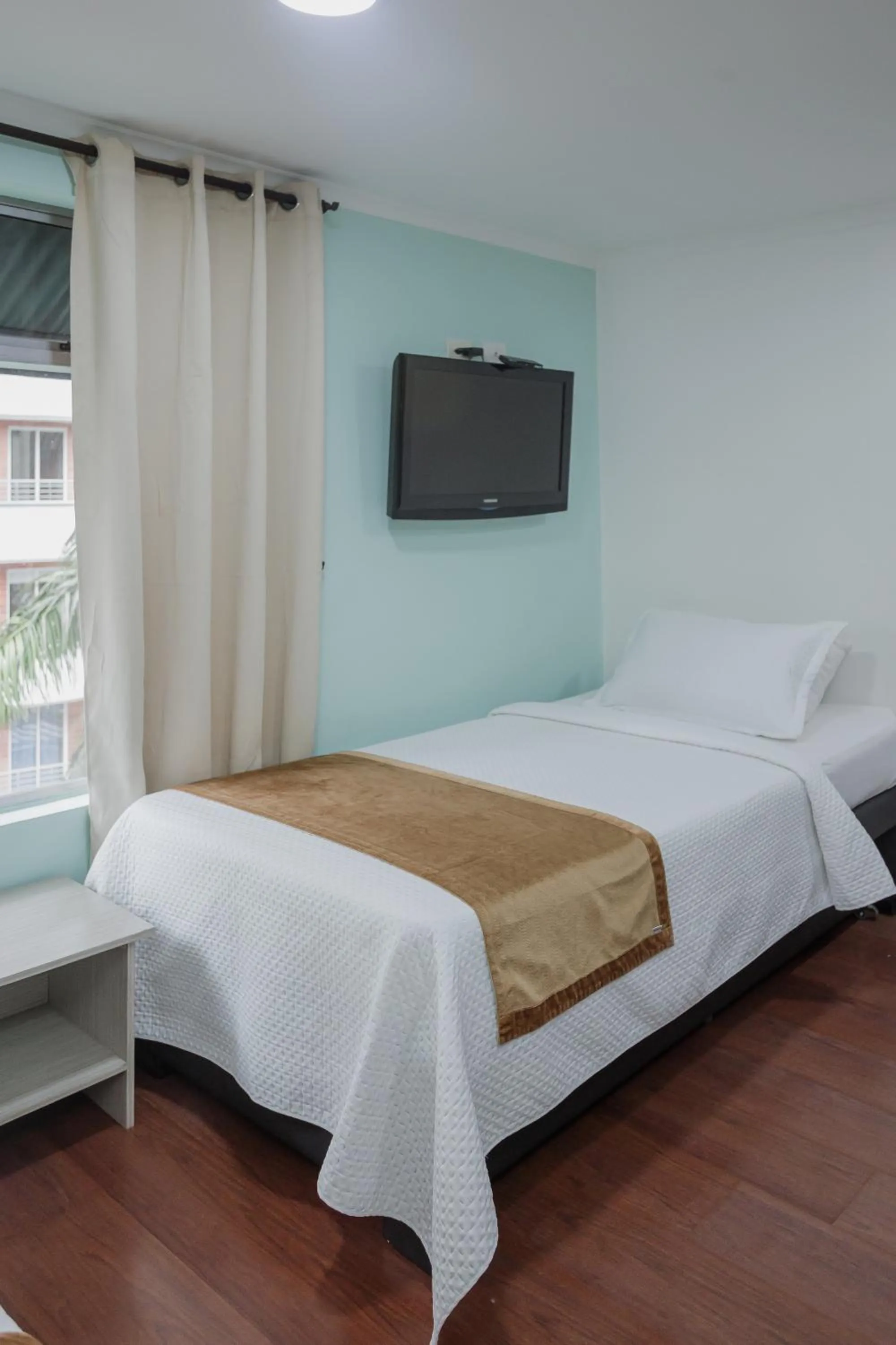 Bed in Hotel Portón Sabaneta