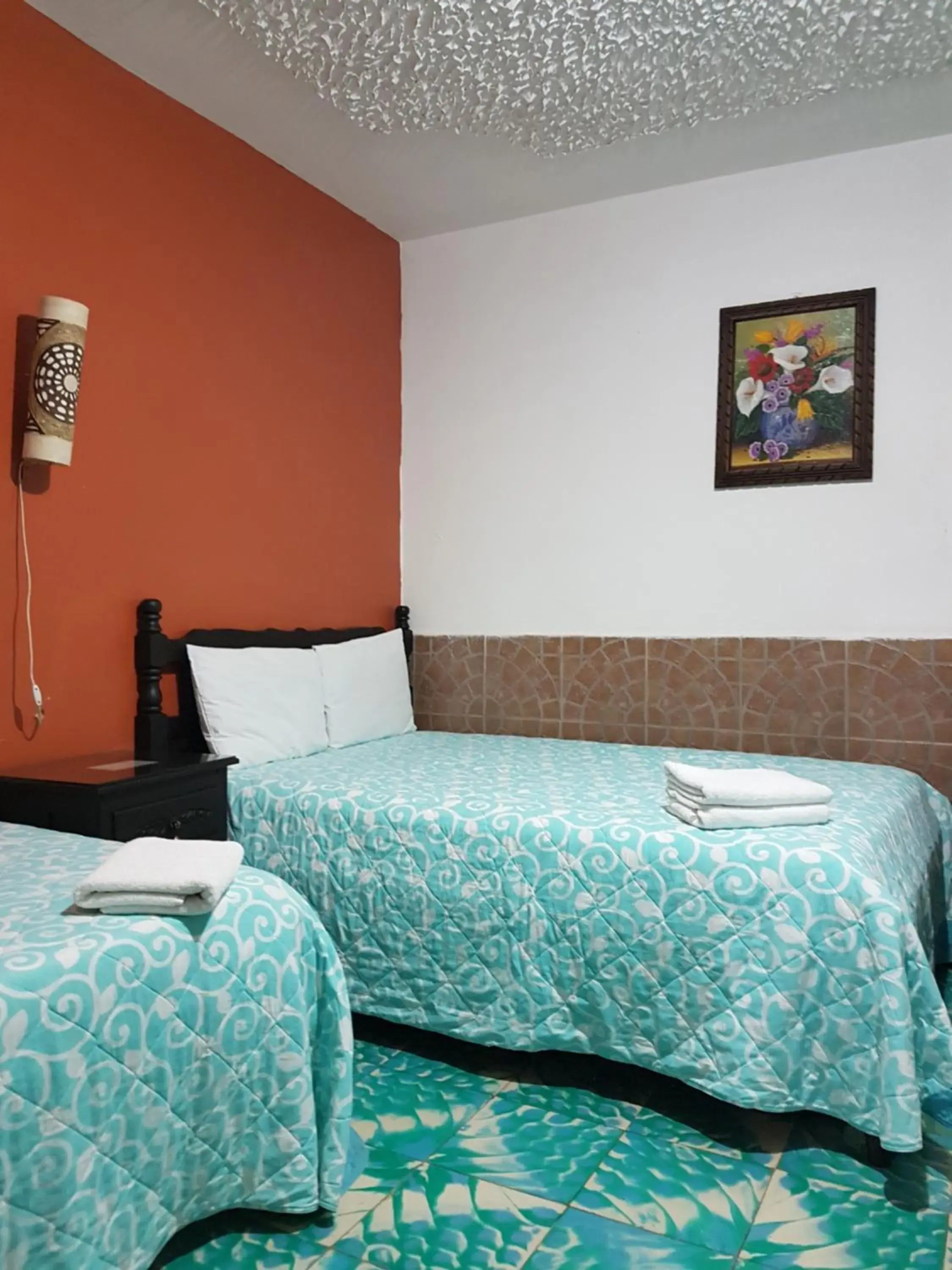 Triple Room with Private Bathroom in Hotel Posada El Gran Cipres Triple Room with Private Bathroom in Hotel Posada El Gran Cipres
