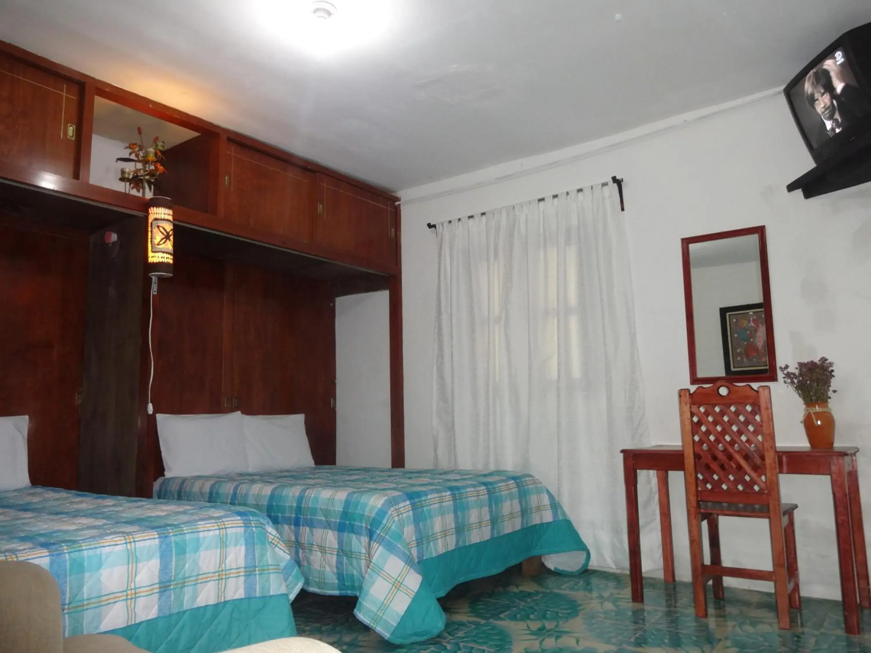 Quadruple Room with Garden View in Hotel Posada El Gran Cipres Quadruple Room with Garden View in Hotel Posada El Gran Cipres
