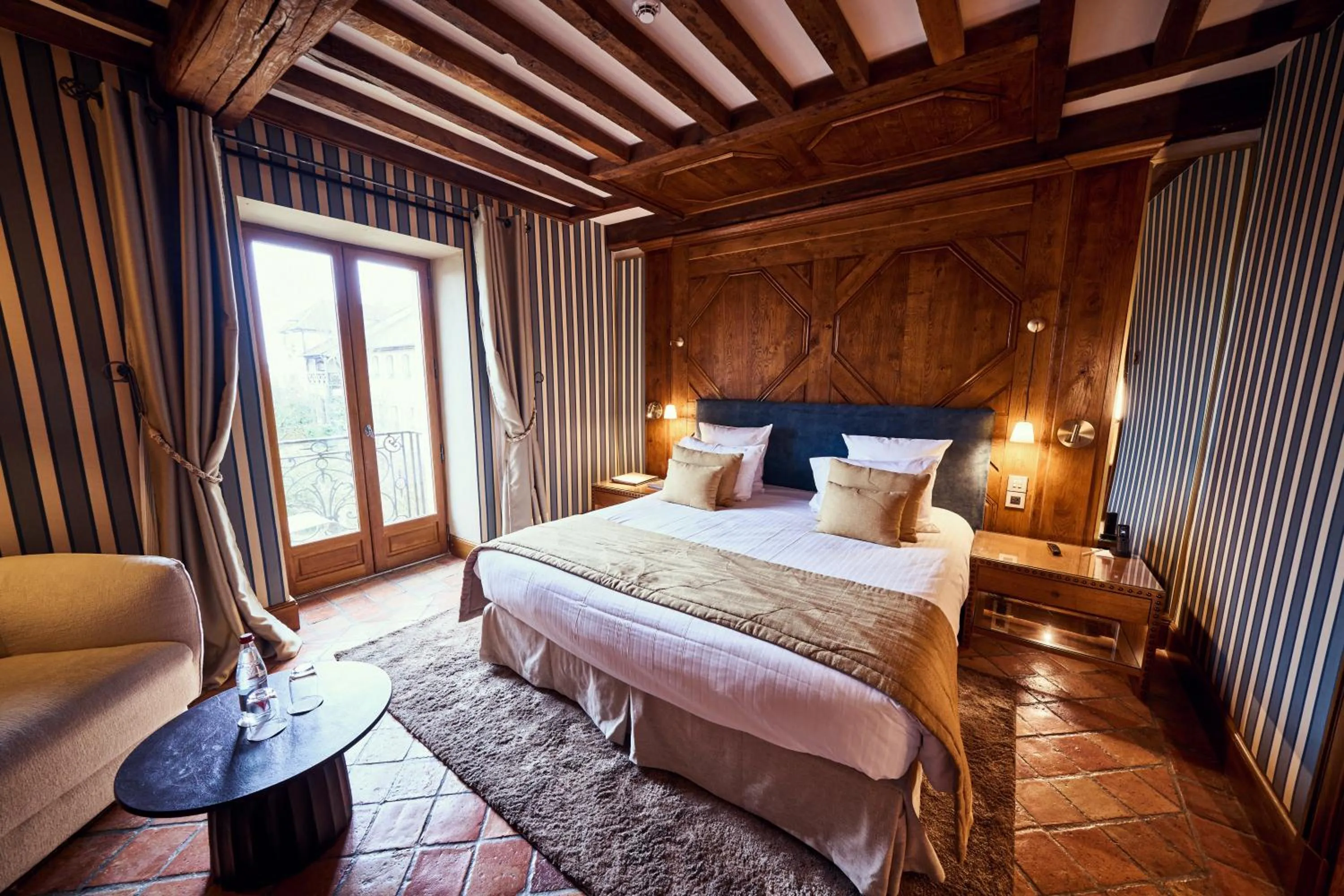 Bed in Relais Bernard Loiseau