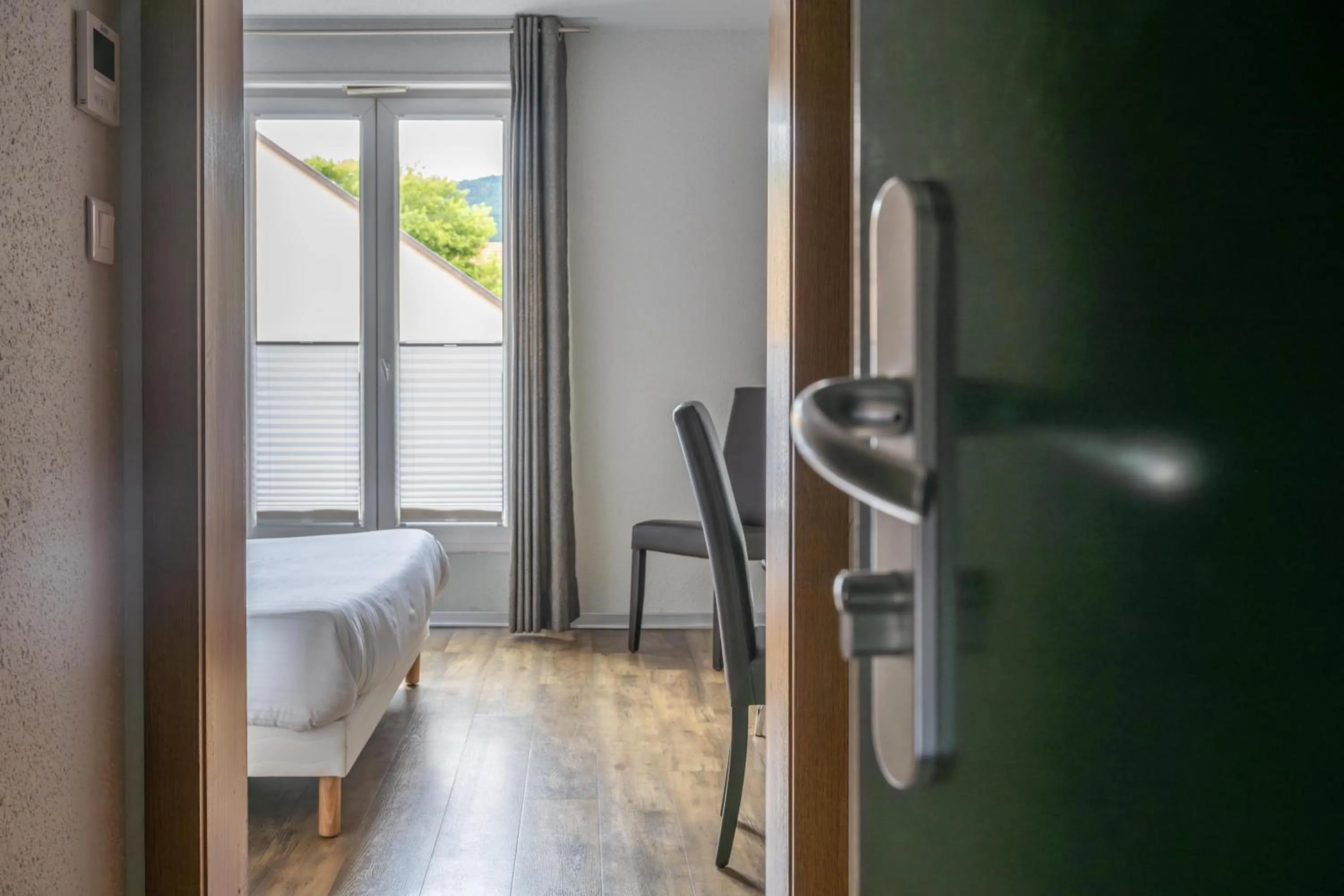 Bedroom in Hotel Colmar Vignes Eguisheim