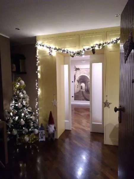 Communal lounge/ TV room in La Casa di Adele Cagliari B&B