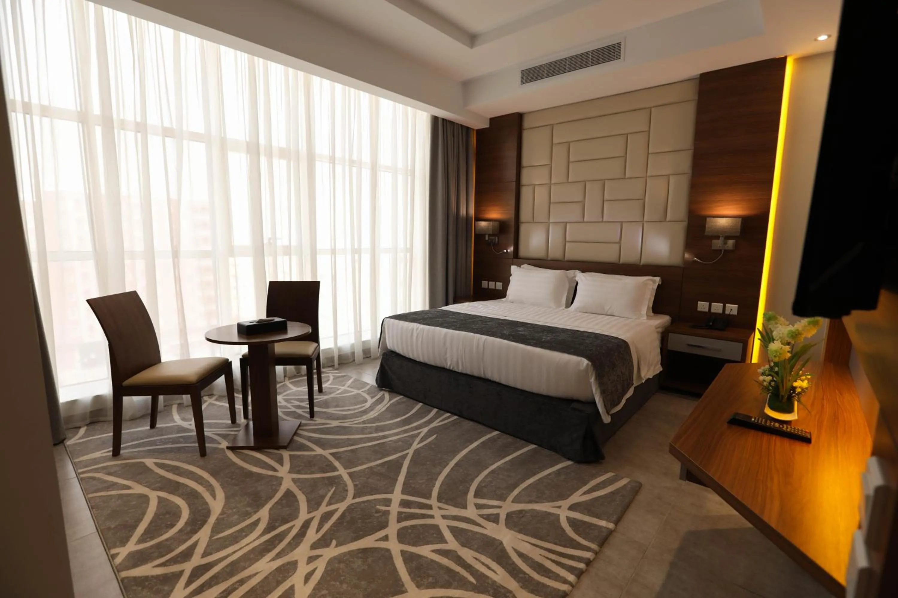 Bed in Diamond Tower Hotel