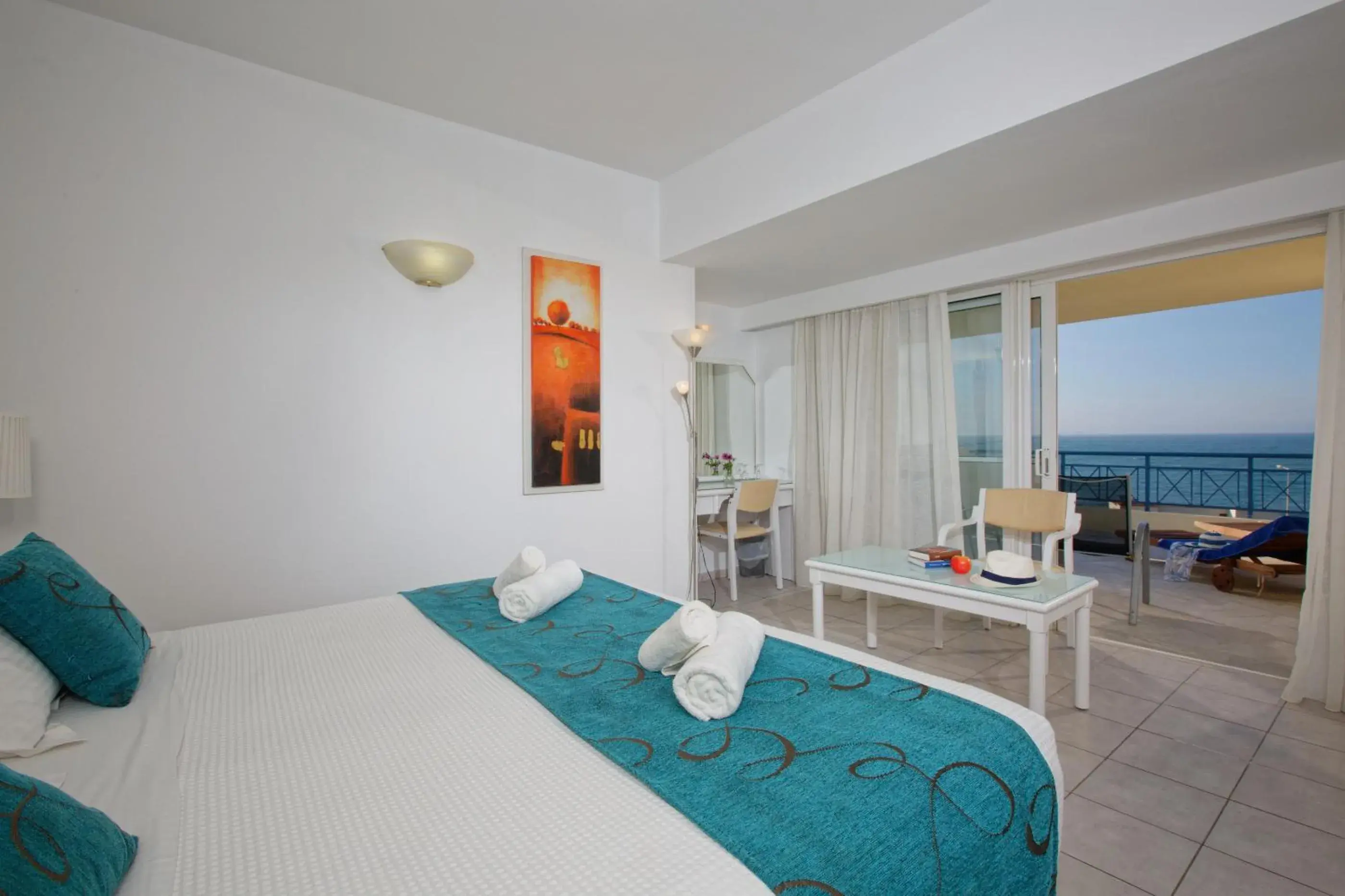 Balcony/Terrace, Bed in Rethymno Mare Royal & Water Park Balcony/Terrace, Bed in Rethymno Mare Royal & Water Park