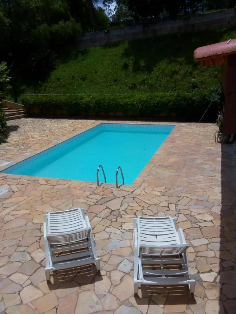 Swimming pool in Pousada Vila Serrana