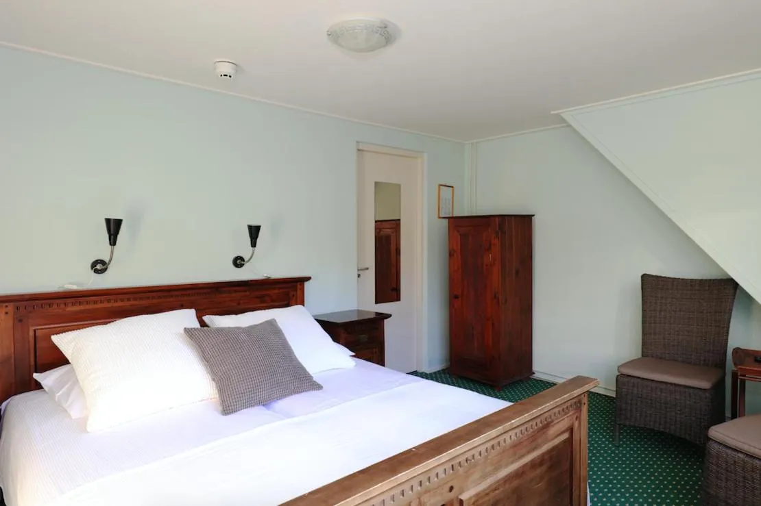 Bed in De Herberg van Anderen