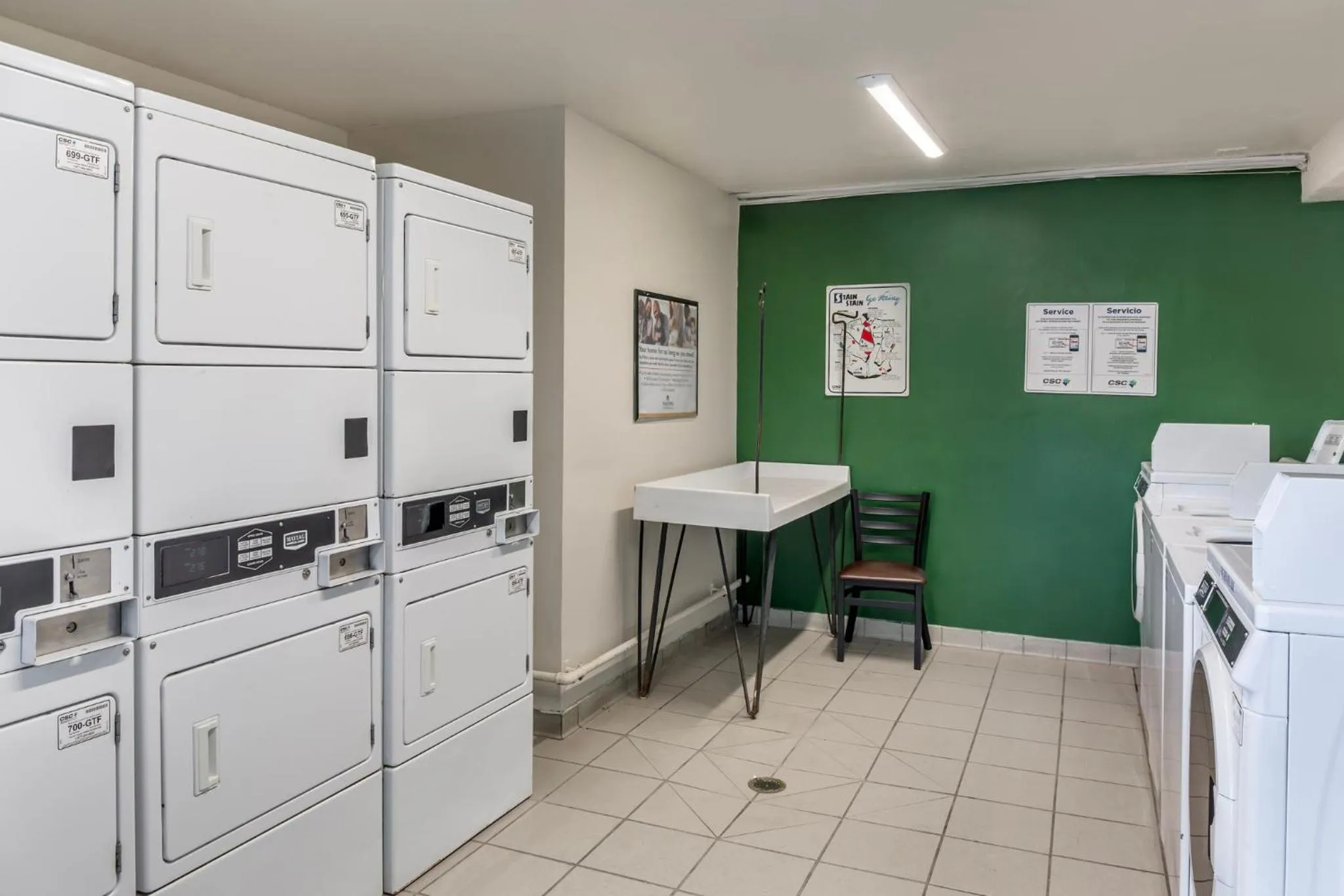 laundry in HomeTowne Studios by Red Roof Louisville