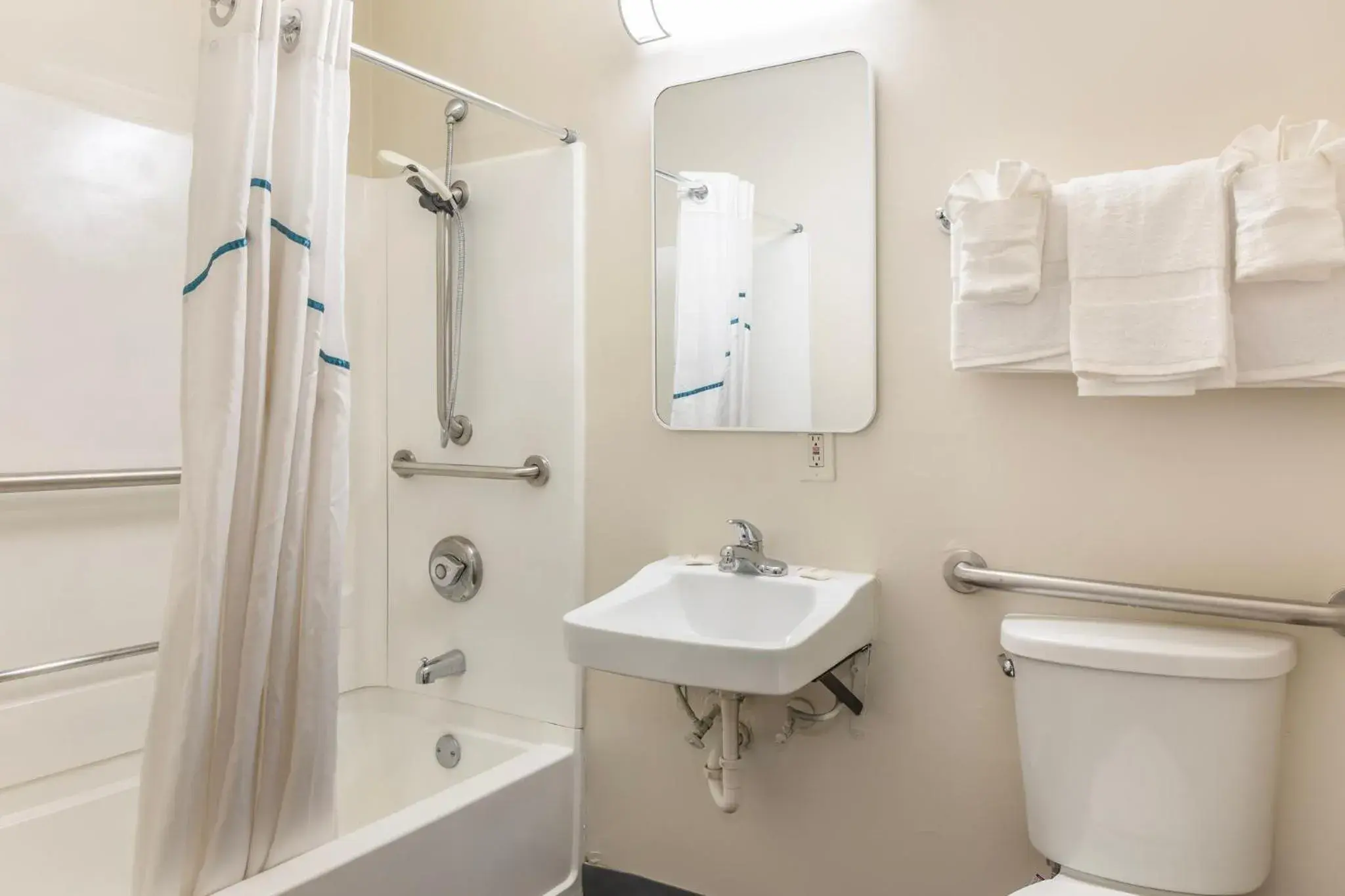 Bathroom in HomeTowne Studios by Red Roof Louisville Bathroom in HomeTowne Studios by Red Roof Louisville