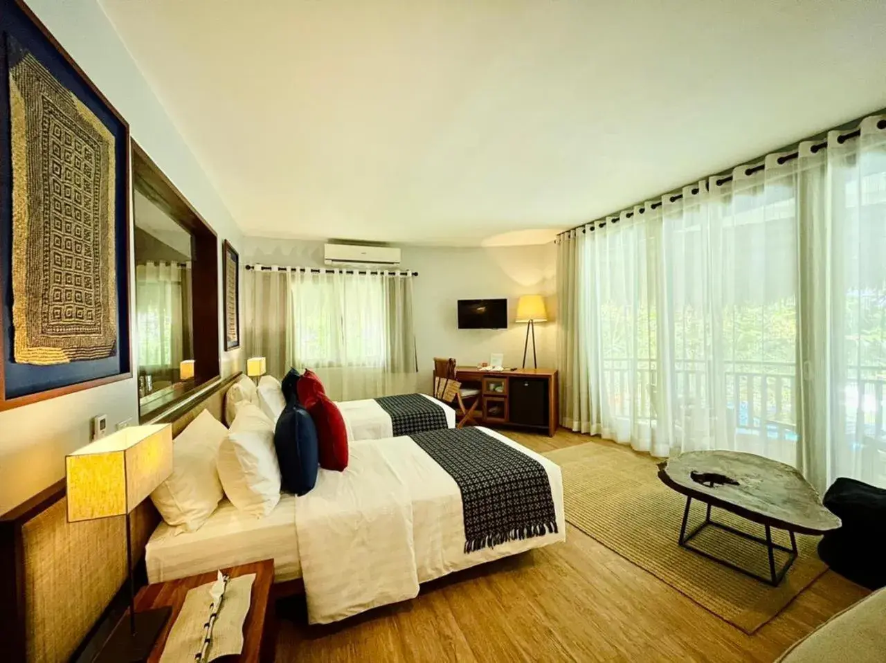 Photo of the whole room, Bed in Amun Ini Beach Resort & Spa Photo of the whole room, Bed in Amun Ini Beach Resort & Spa