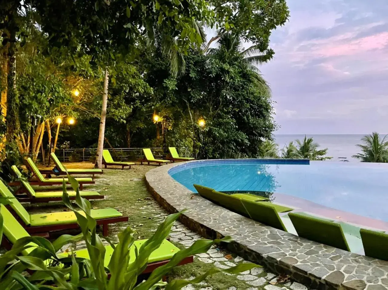 Swimming pool in Amun Ini Beach Resort & Spa Swimming pool in Amun Ini Beach Resort & Spa