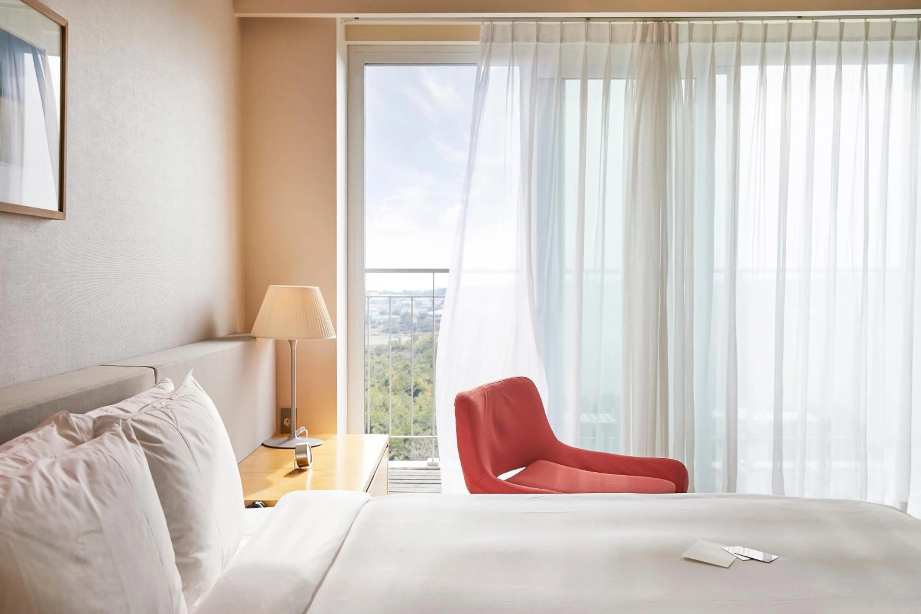 Bedroom, Bed in Haevichi Hotel & Resort Jeju