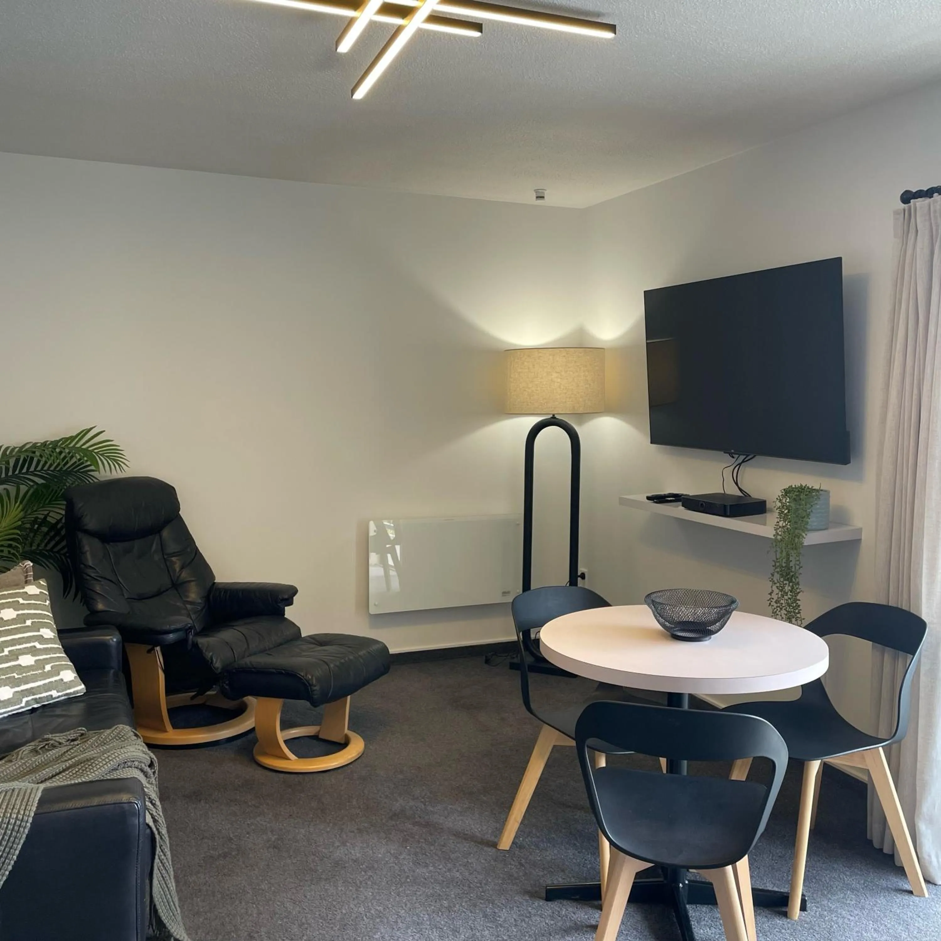 Living room in Apex Motorlodge