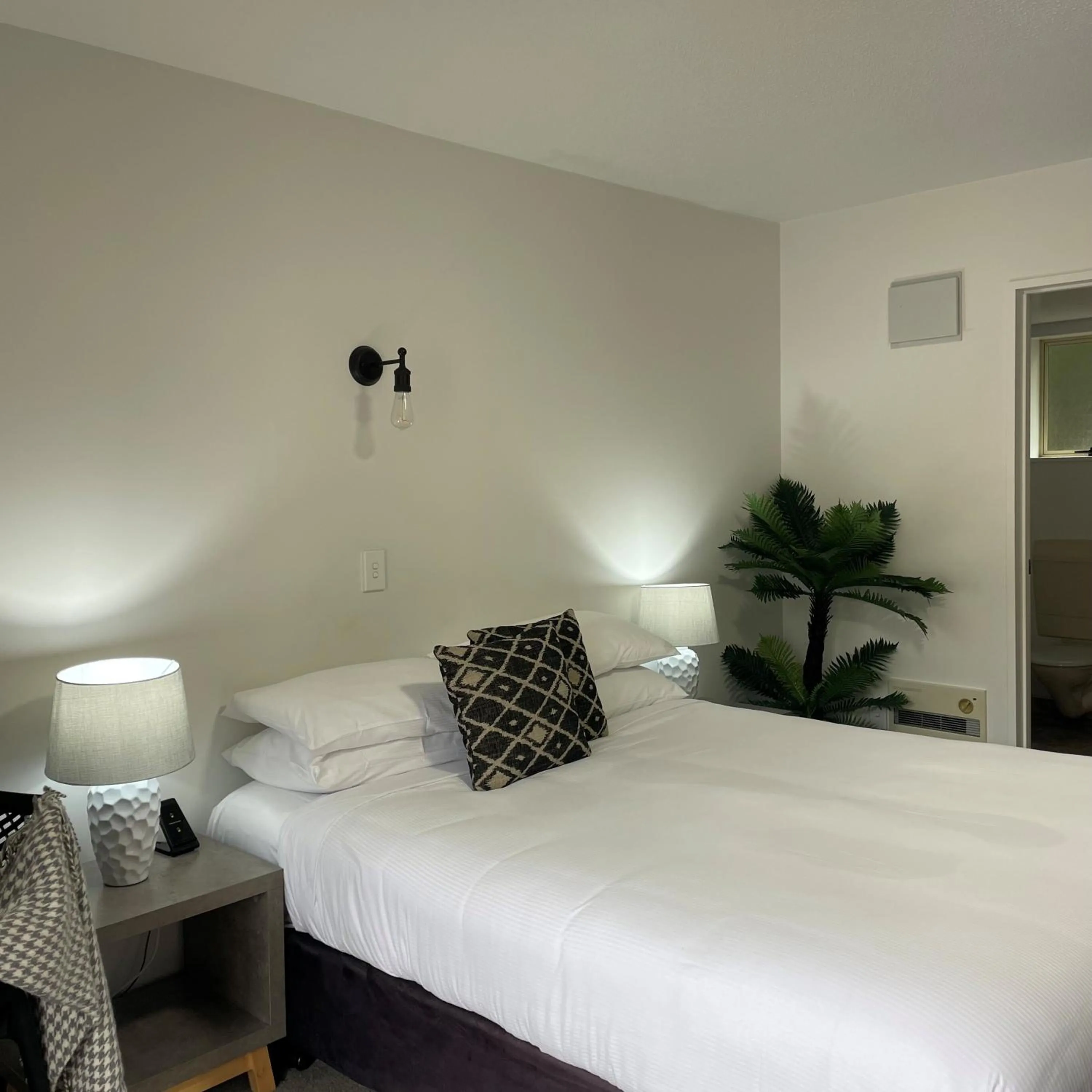 Bed in Apex Motorlodge