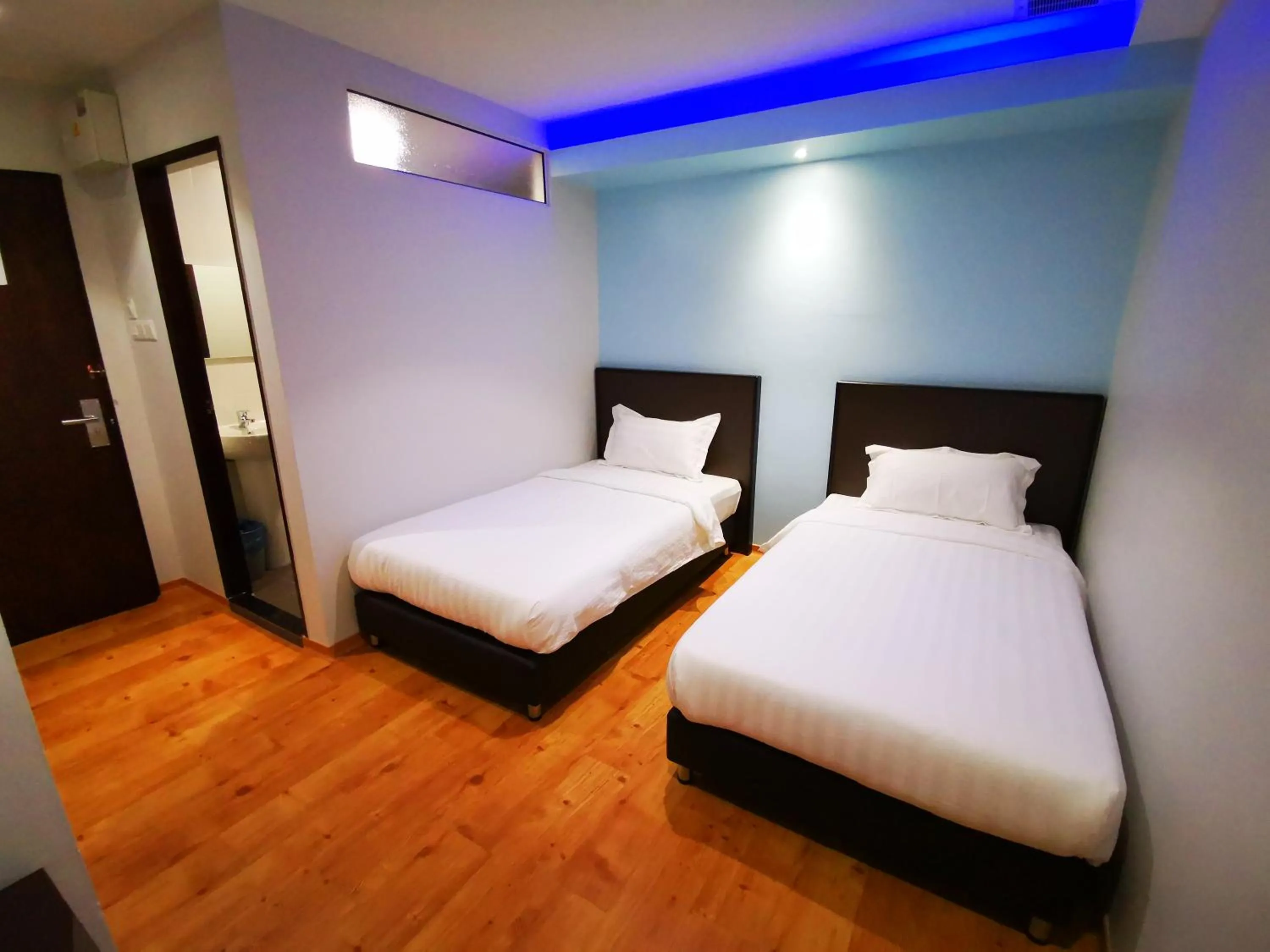 Photo of the whole room, Bed in D'Green Hotel Kuching