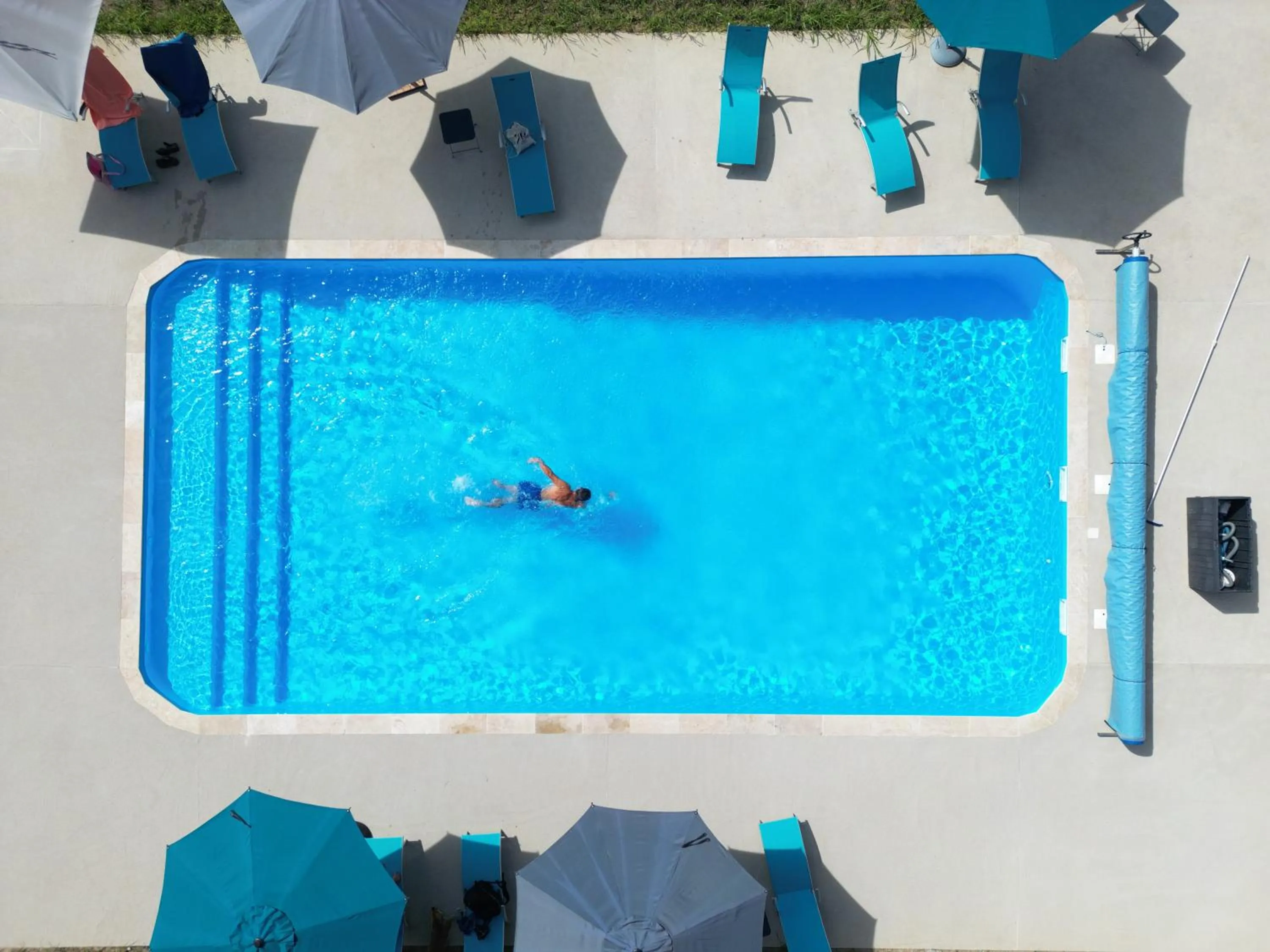 Swimming pool in Logis des Crêtes de Pignols