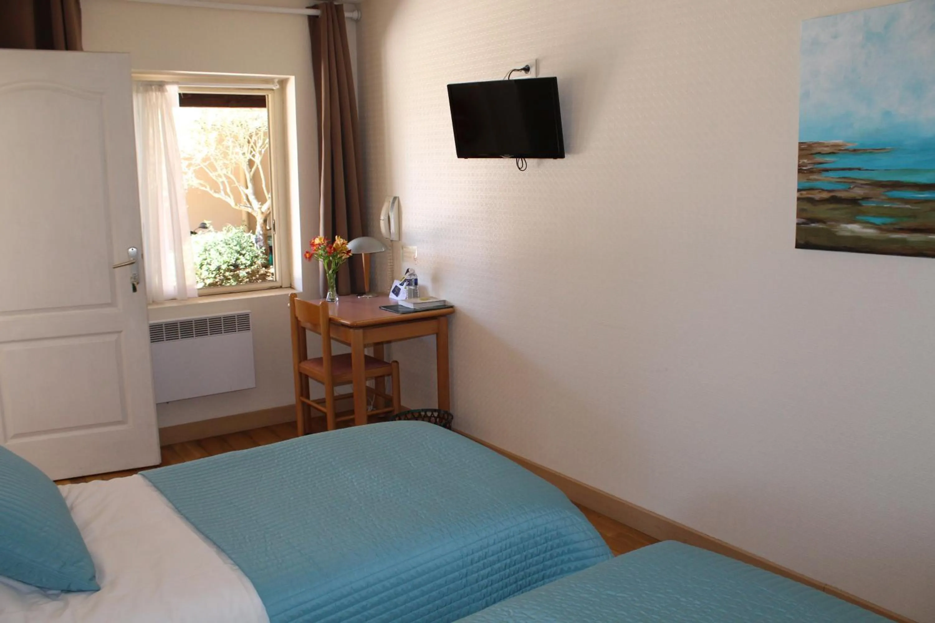 Bed in Logis des Crêtes de Pignols