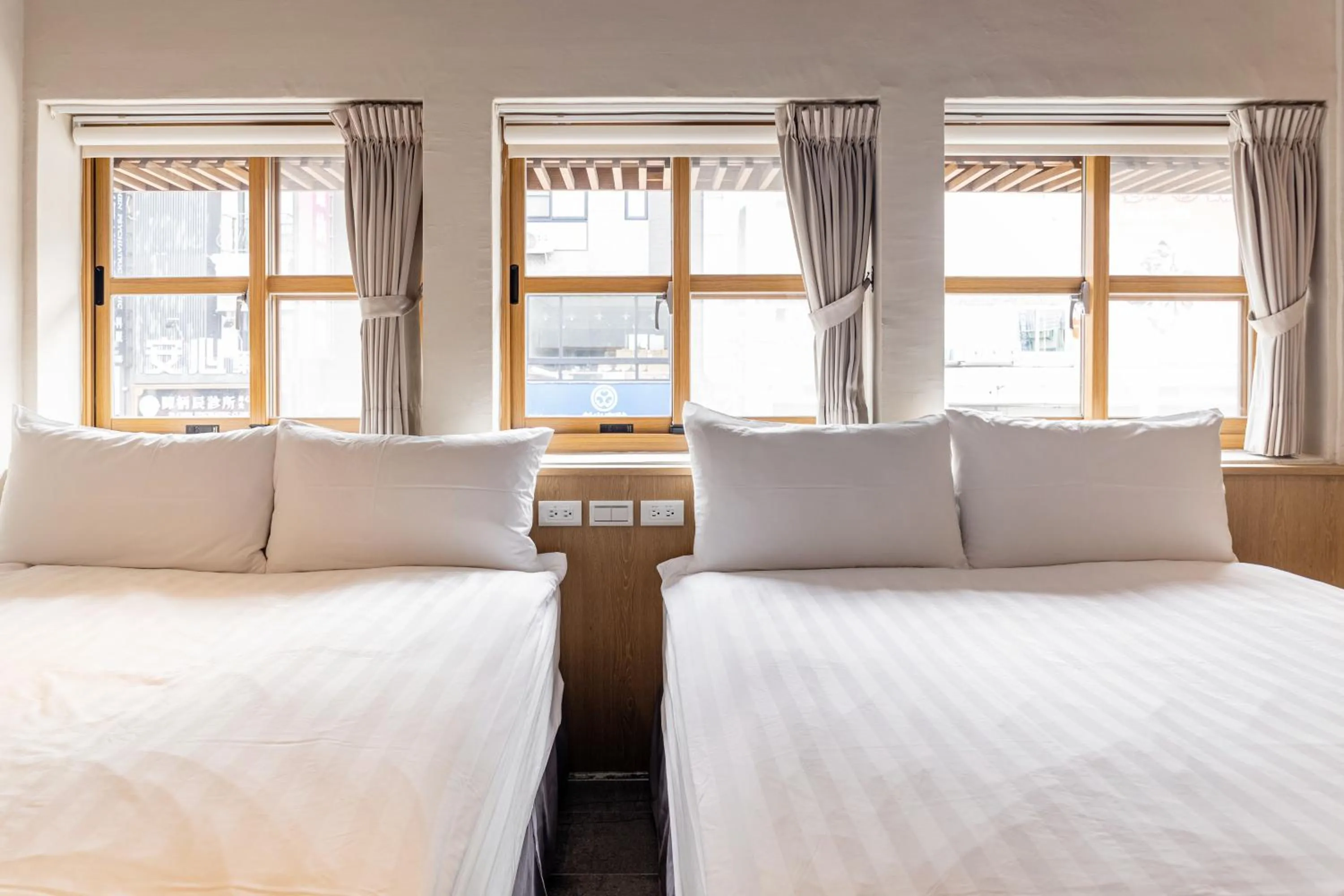 Bed in Tiin Tinn Inn - Tiehua Xiutai