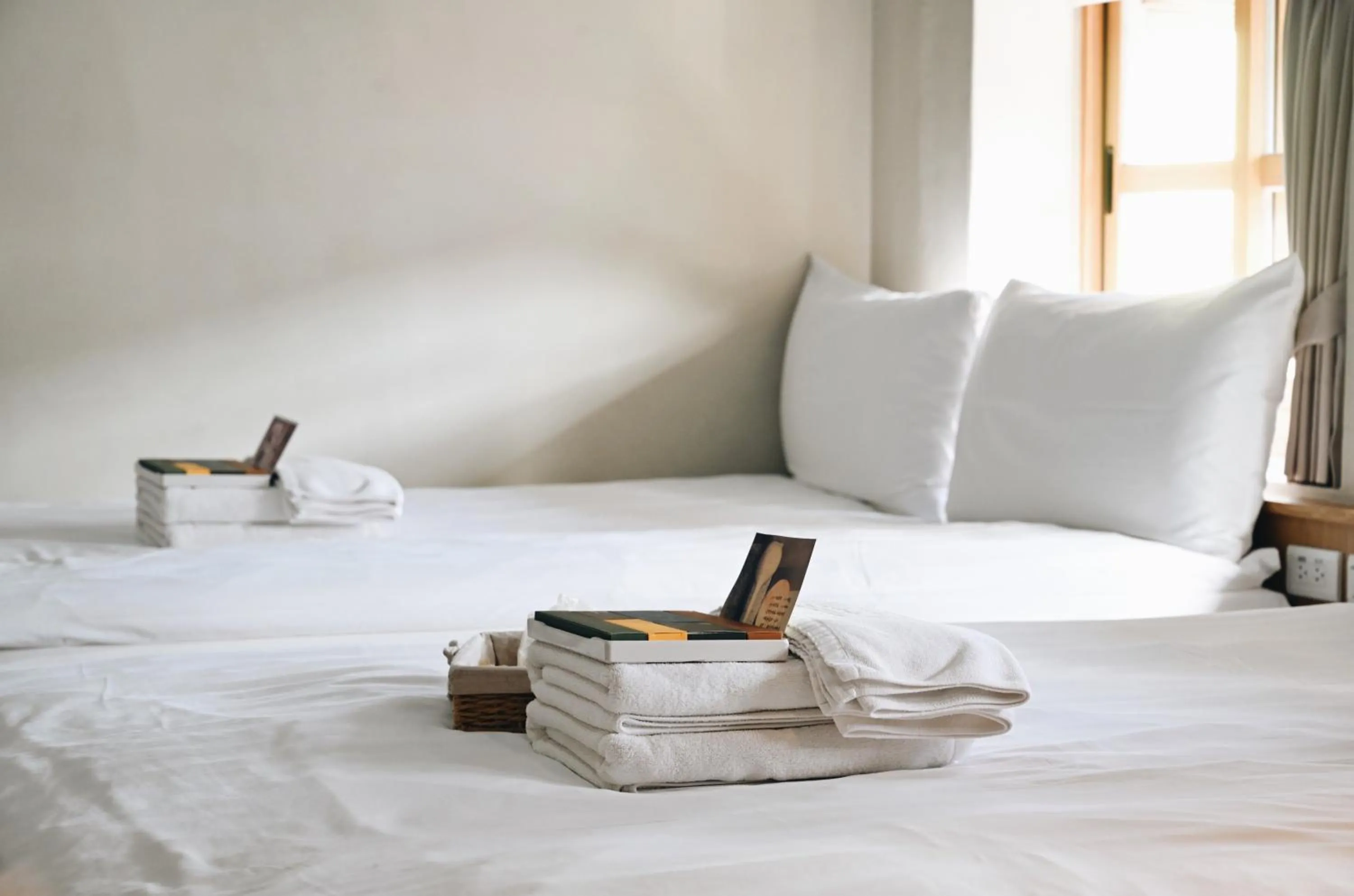 towels, Bed in Tiin Tinn Inn - Tiehua Xiutai