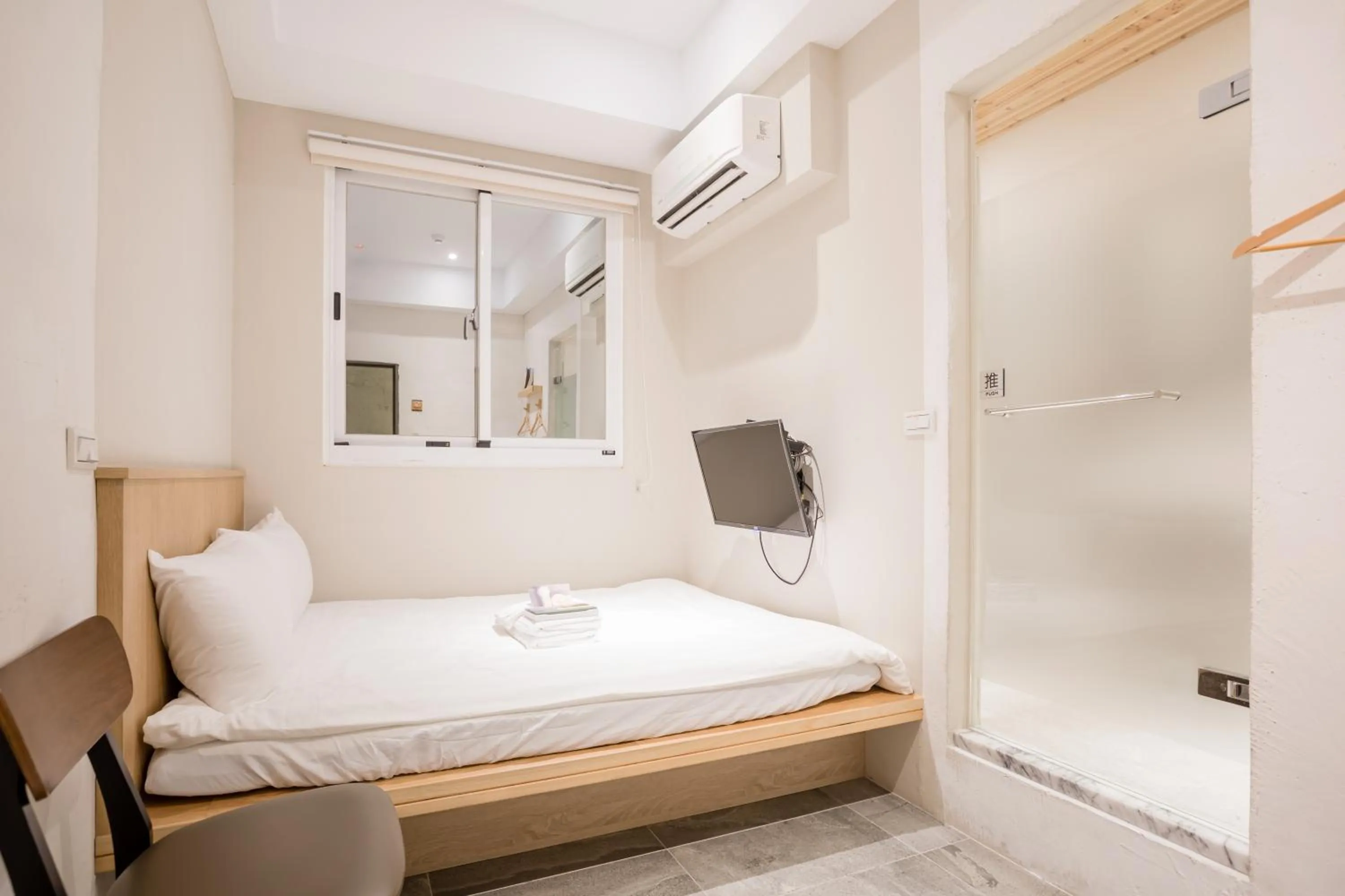 Bed in Tiin Tinn Inn - Tiehua Xiutai