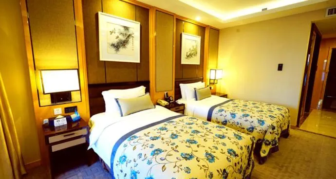 Bed in Beijing Yun-zen Jinling Lotus Hotel