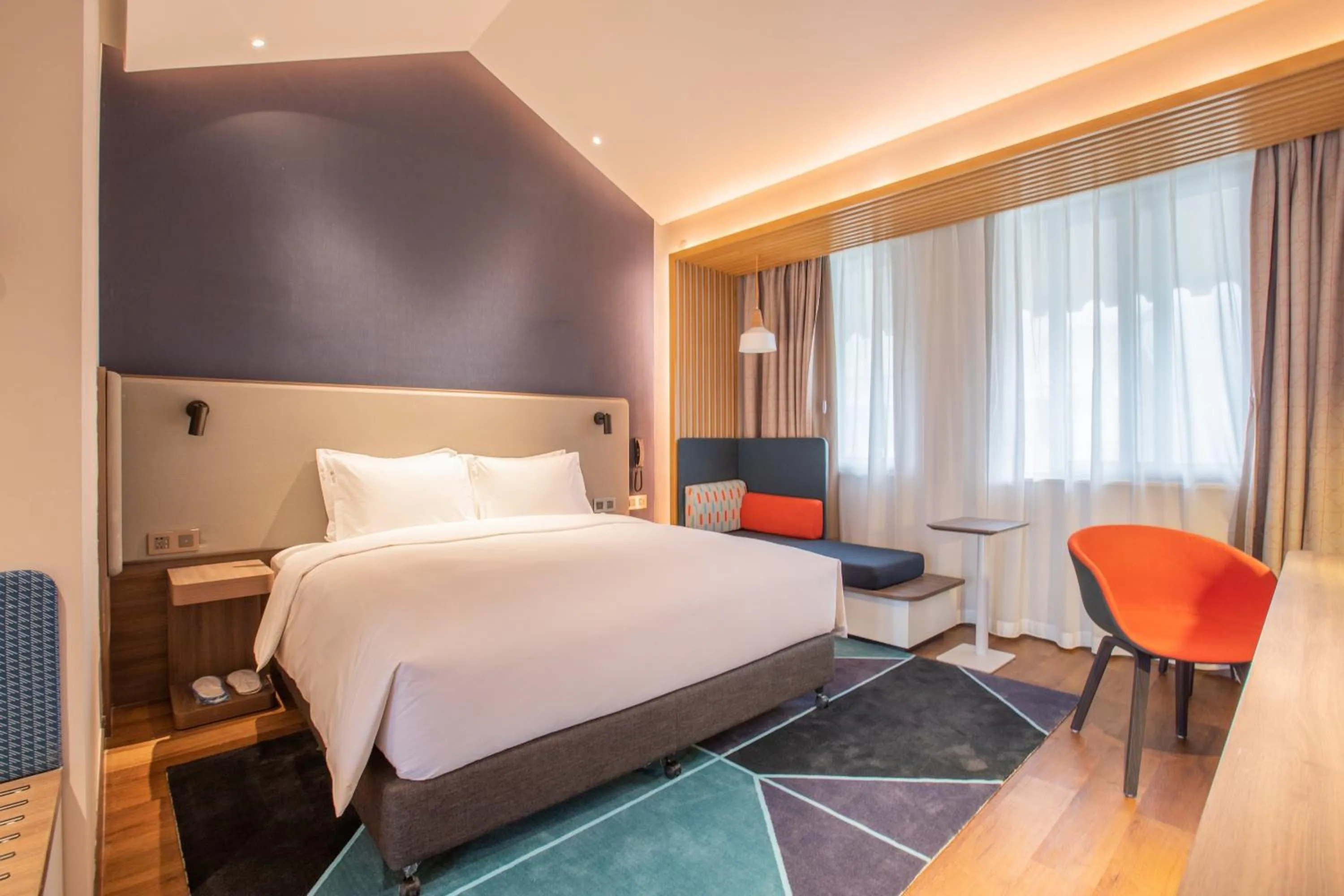 Photo of the whole room, Bed in Holiday Inn Express Guizhou Qinglong by IHG