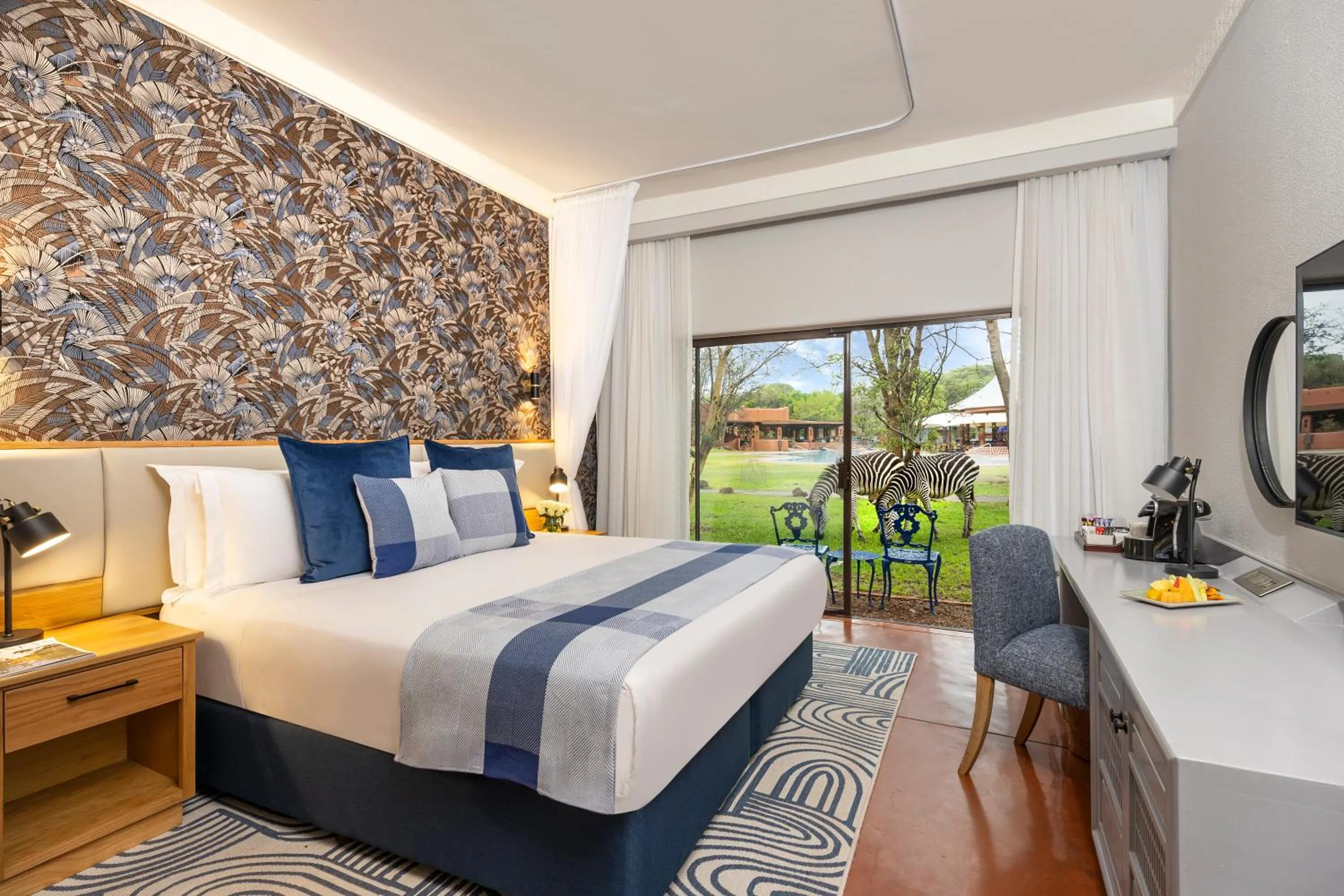 Bed in Avani Victoria Falls Resort