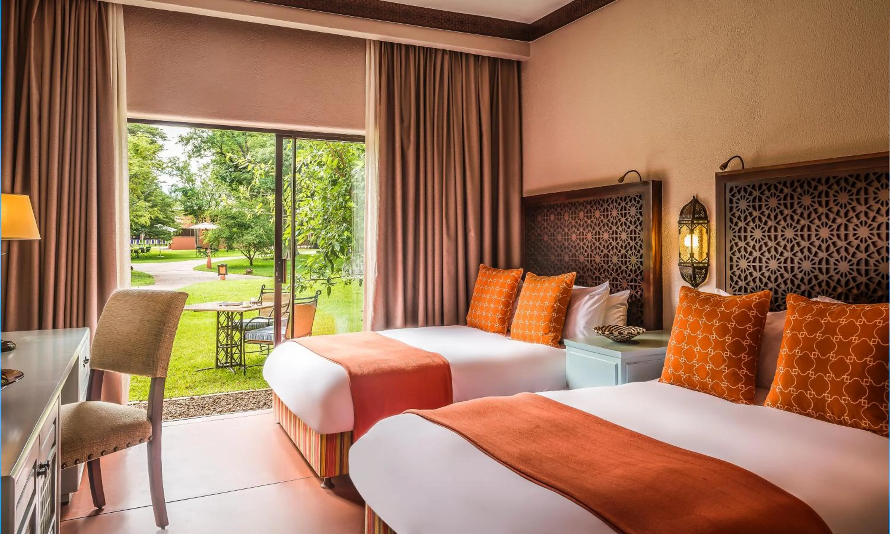 Photo of the whole room, Bed in Avani Victoria Falls Resort