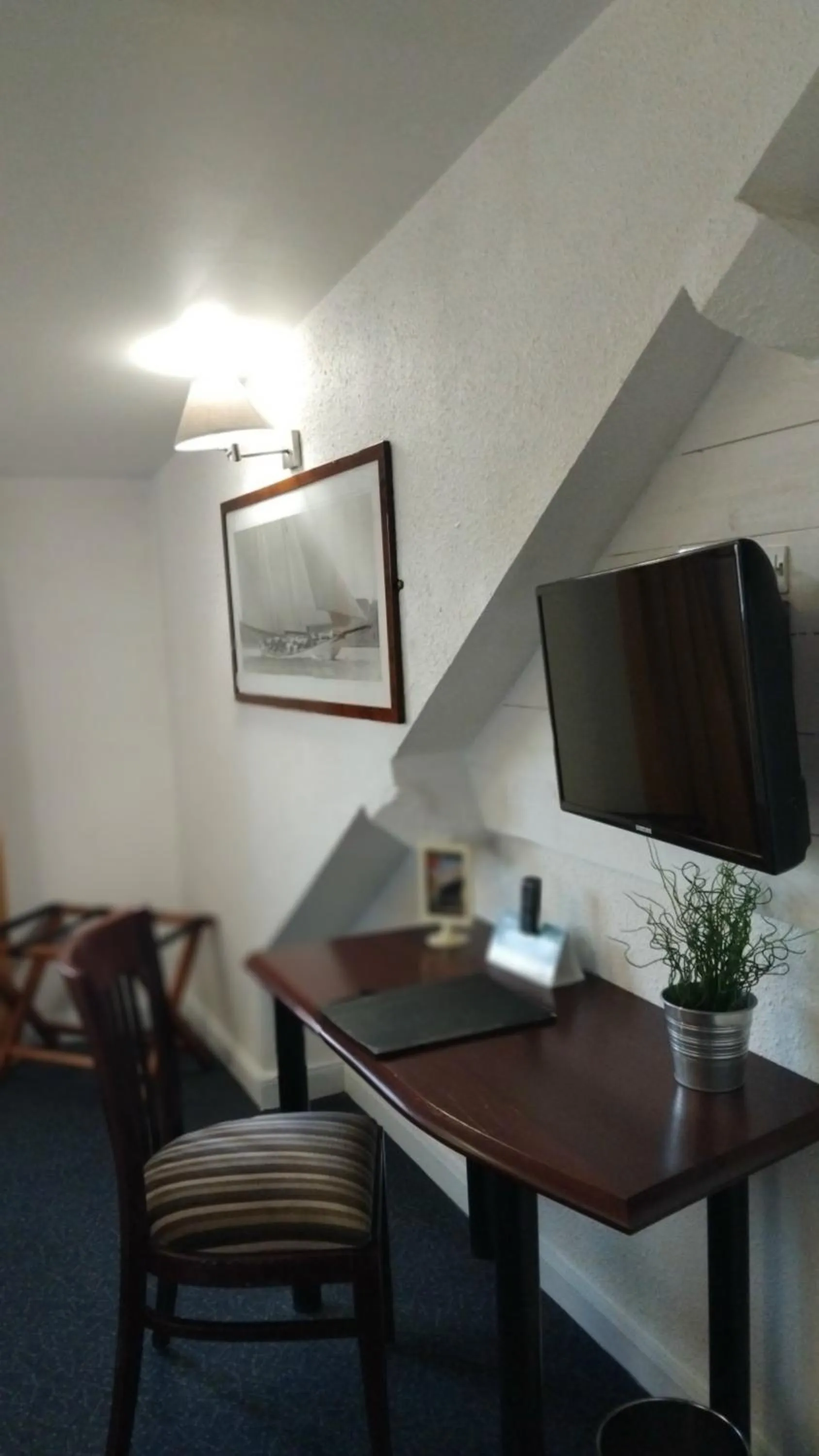 Seating area in Logis HOTEL RESTAURANT La Régence