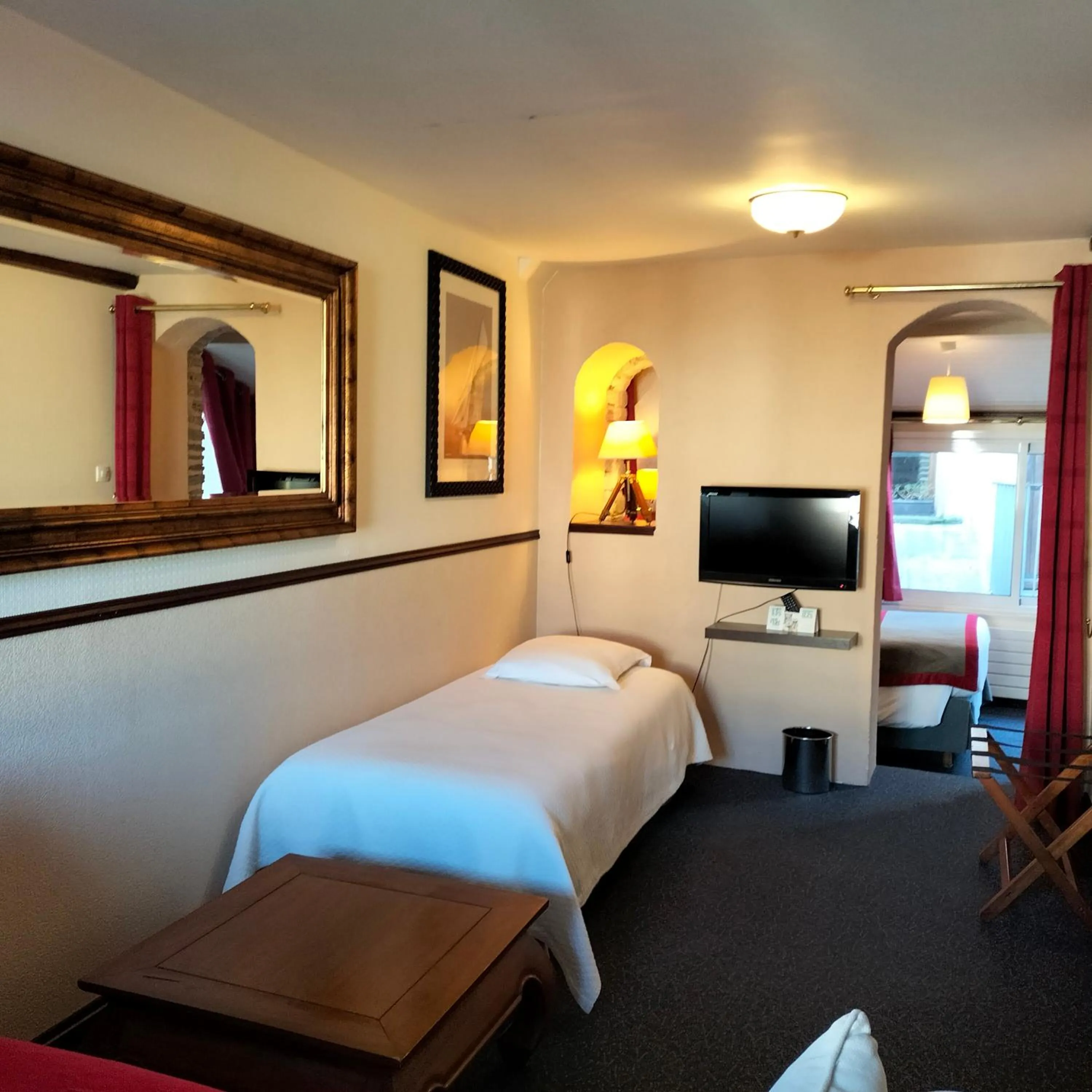 Photo of the whole room, Bed in Logis HOTEL RESTAURANT La Régence