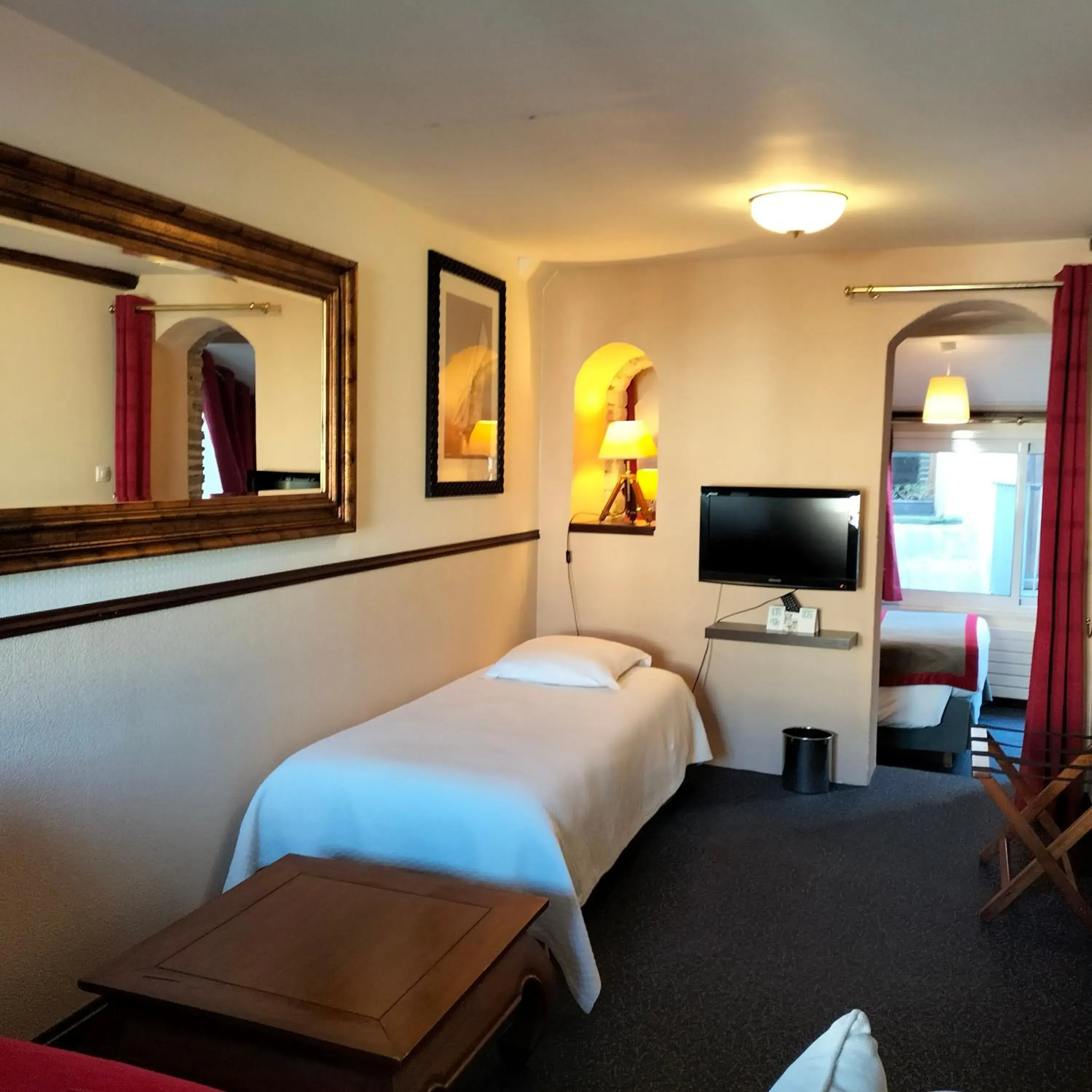 Photo of the whole room, Bed in Logis HOTEL RESTAURANT La Régence Photo of the whole room, Bed in Logis HOTEL RESTAURANT La Régence