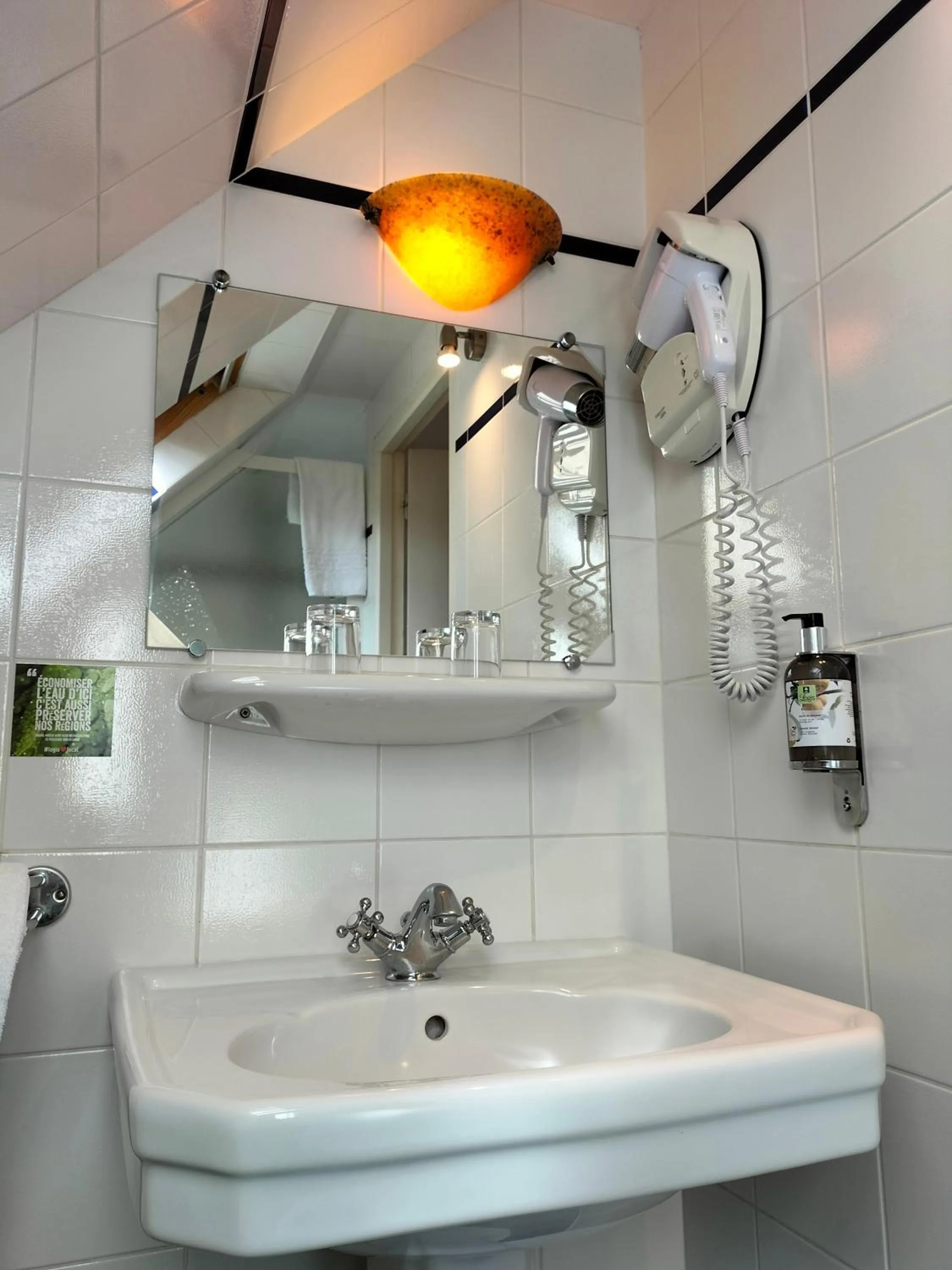 Bathroom in Logis HOTEL RESTAURANT La Régence