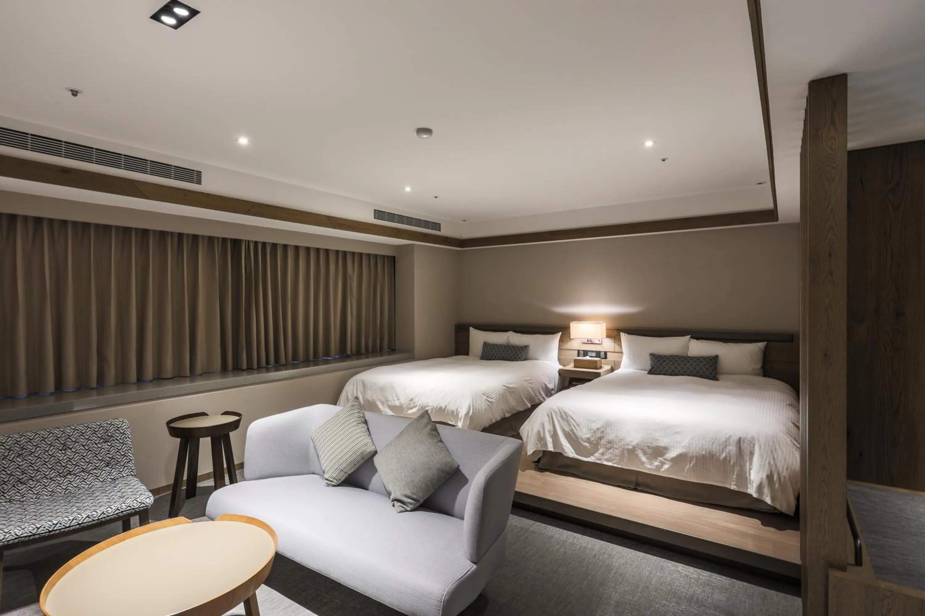 Living room, Bed in Hotel Royal Chihpin