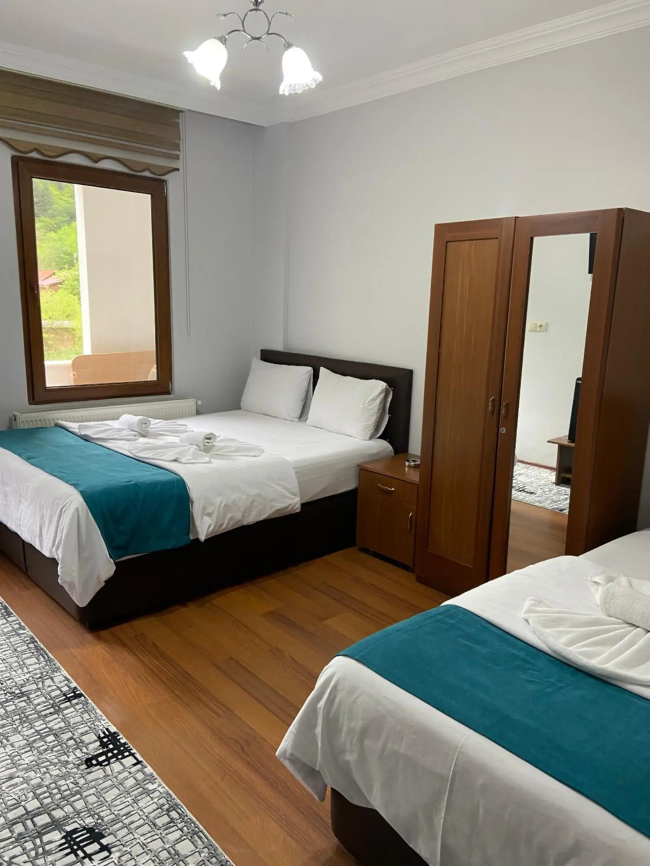 Triple Room with Balcony and River View in Uzungol Soylu Hotel Triple Room with Balcony and River View in Uzungol Soylu Hotel