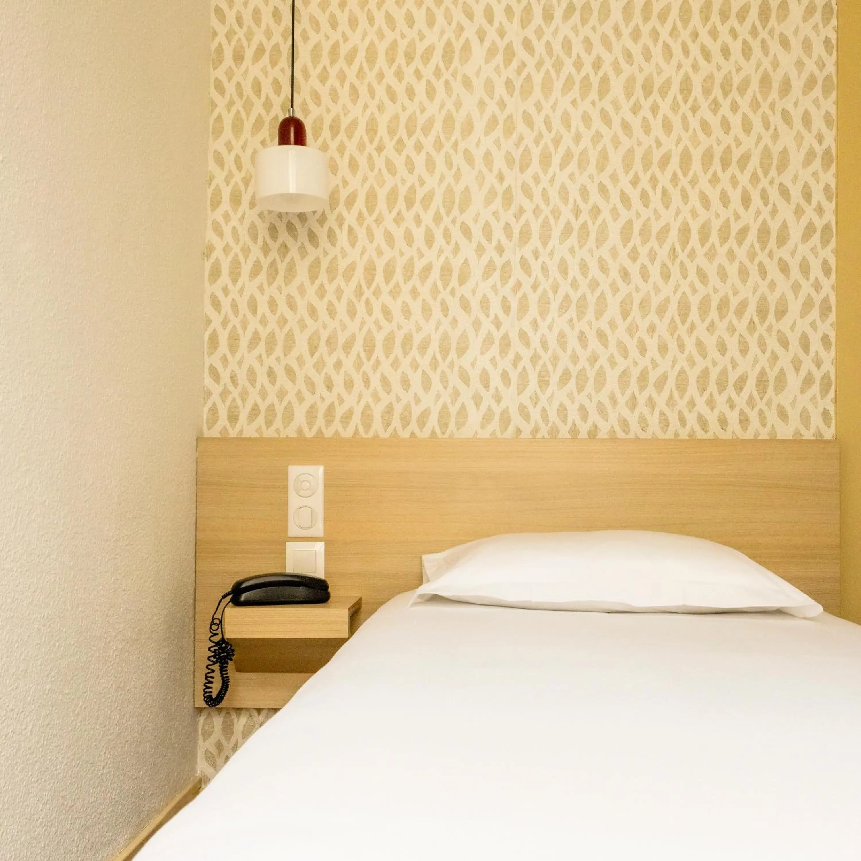 Bed in Hotel Gambetta Bed in Hotel Gambetta