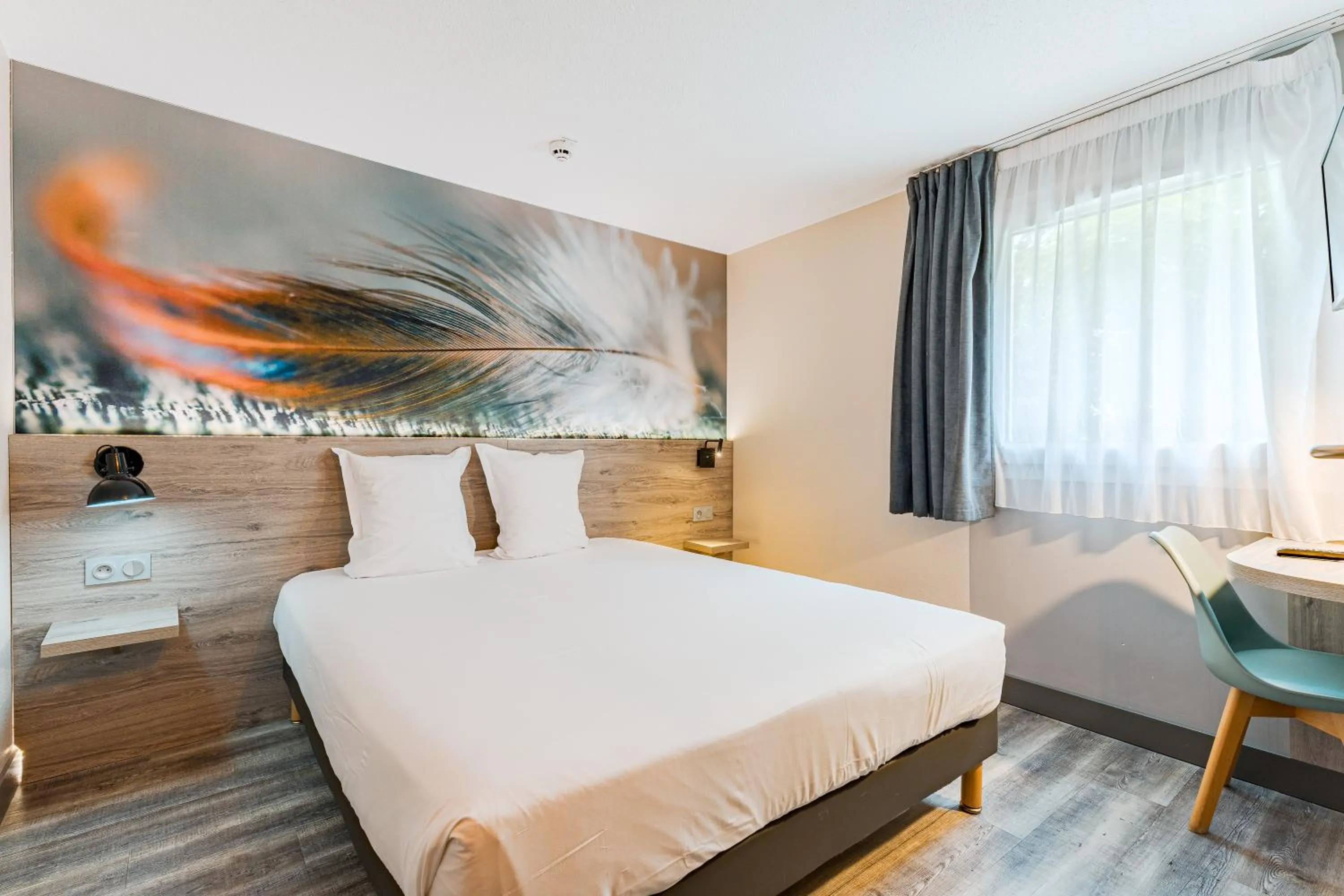 Bed in Kyriad Direct Tours Sud - Chambray Lès Tours