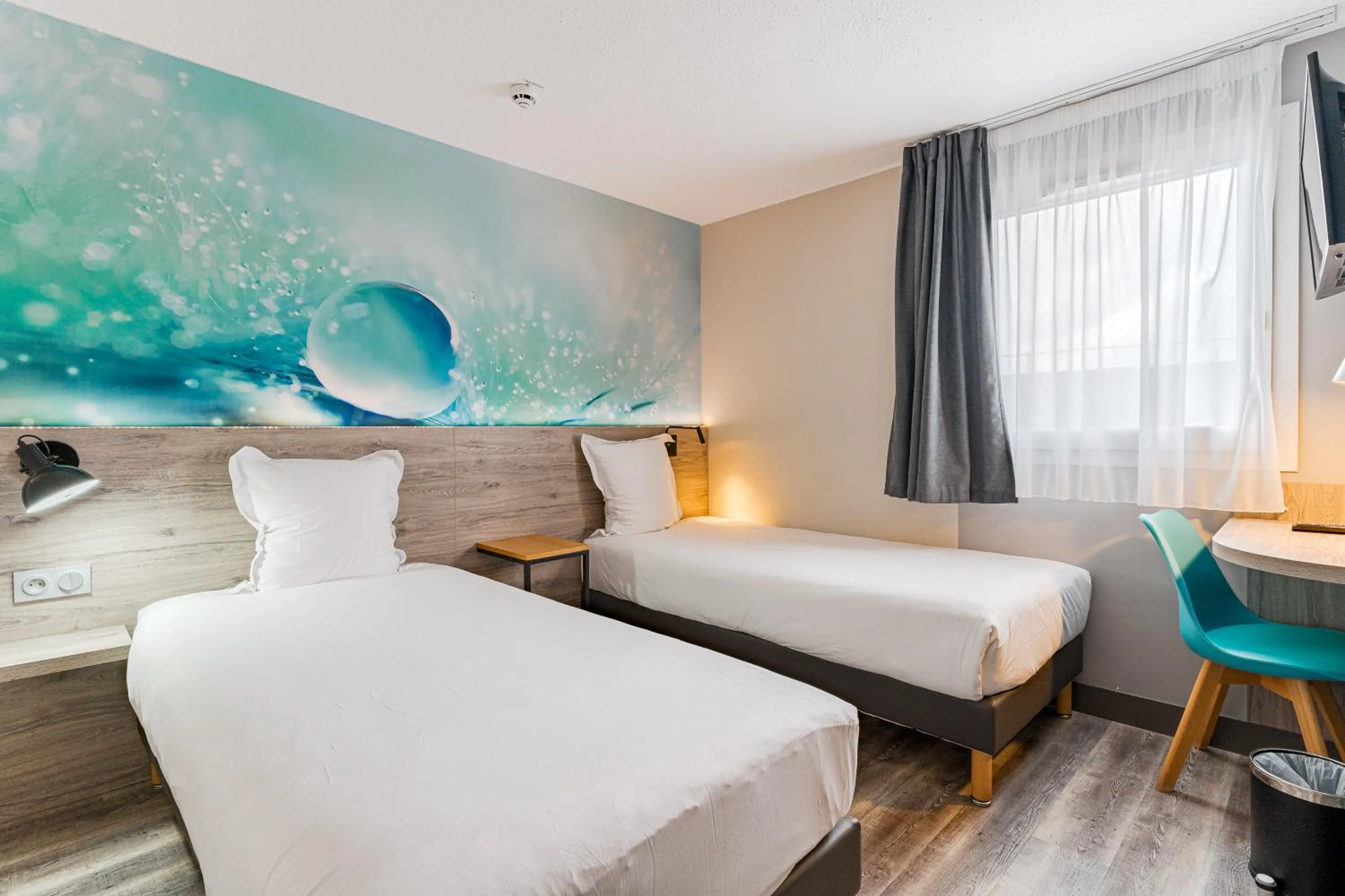 Bed in Kyriad Direct Tours Sud - Chambray Lès Tours