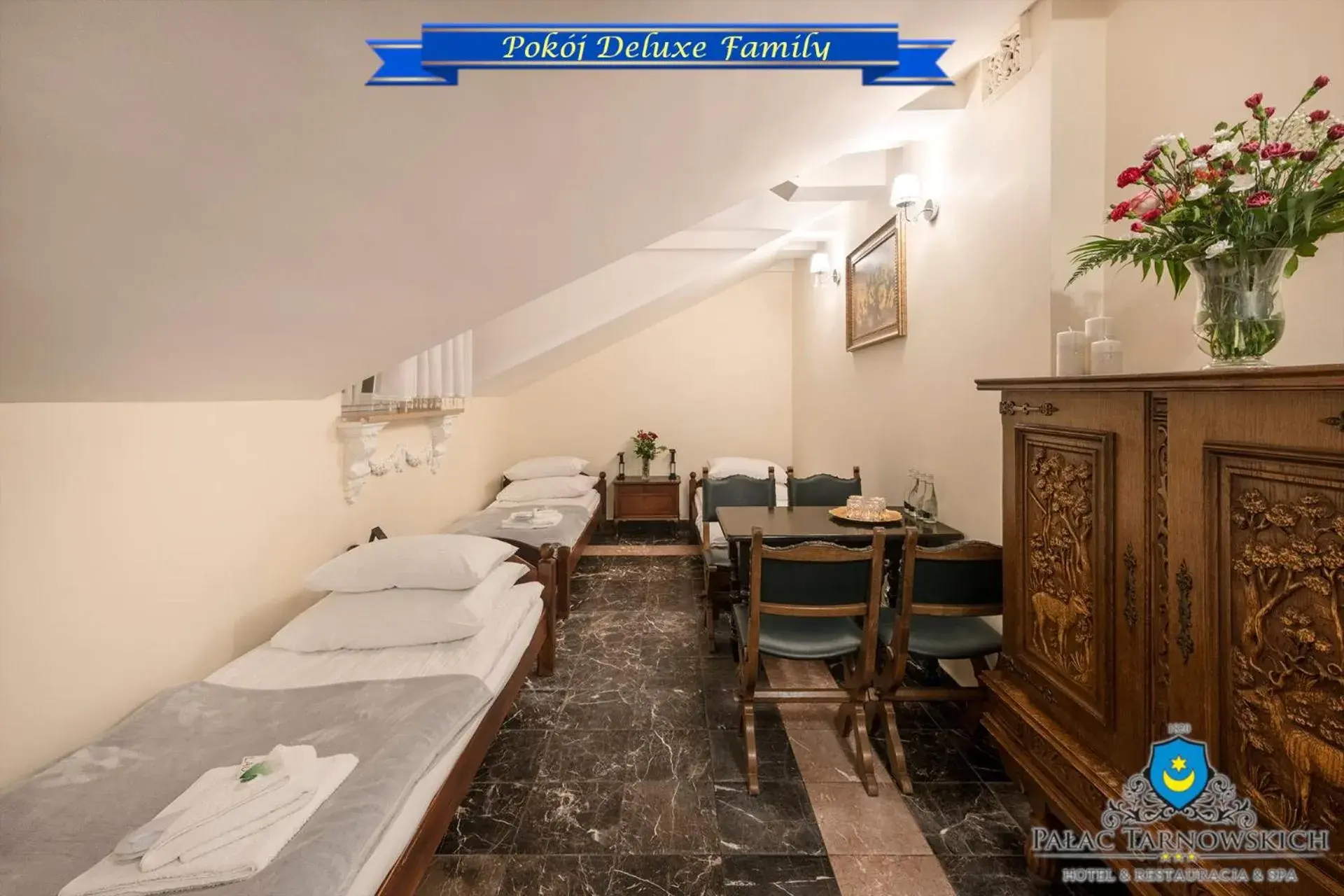 Deluxe Family Room - single occupancy in Pałac Tarnowskich Hotel & Restauracja & SPA Deluxe Family Room - single occupancy in Pałac Tarnowskich Hotel & Restauracja & SPA