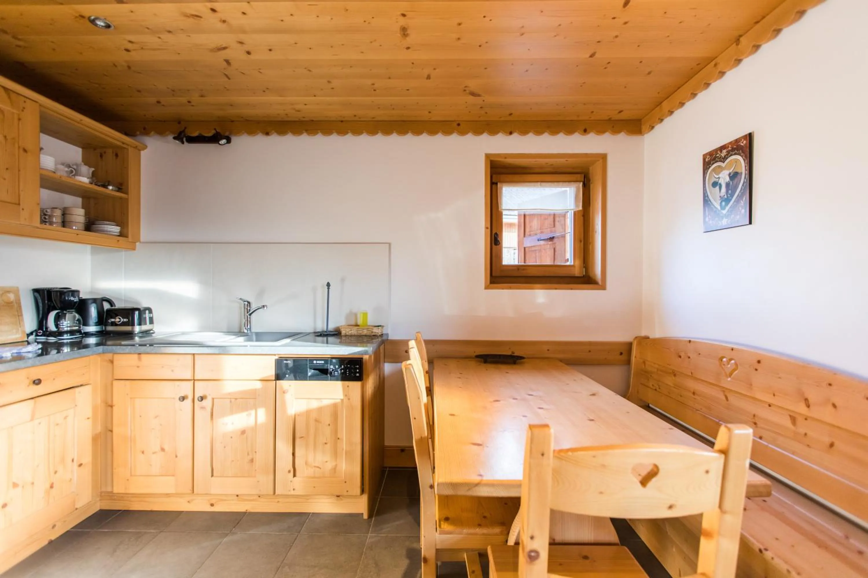 Kitchen or kitchenette in Les Chalets de La Griyotire